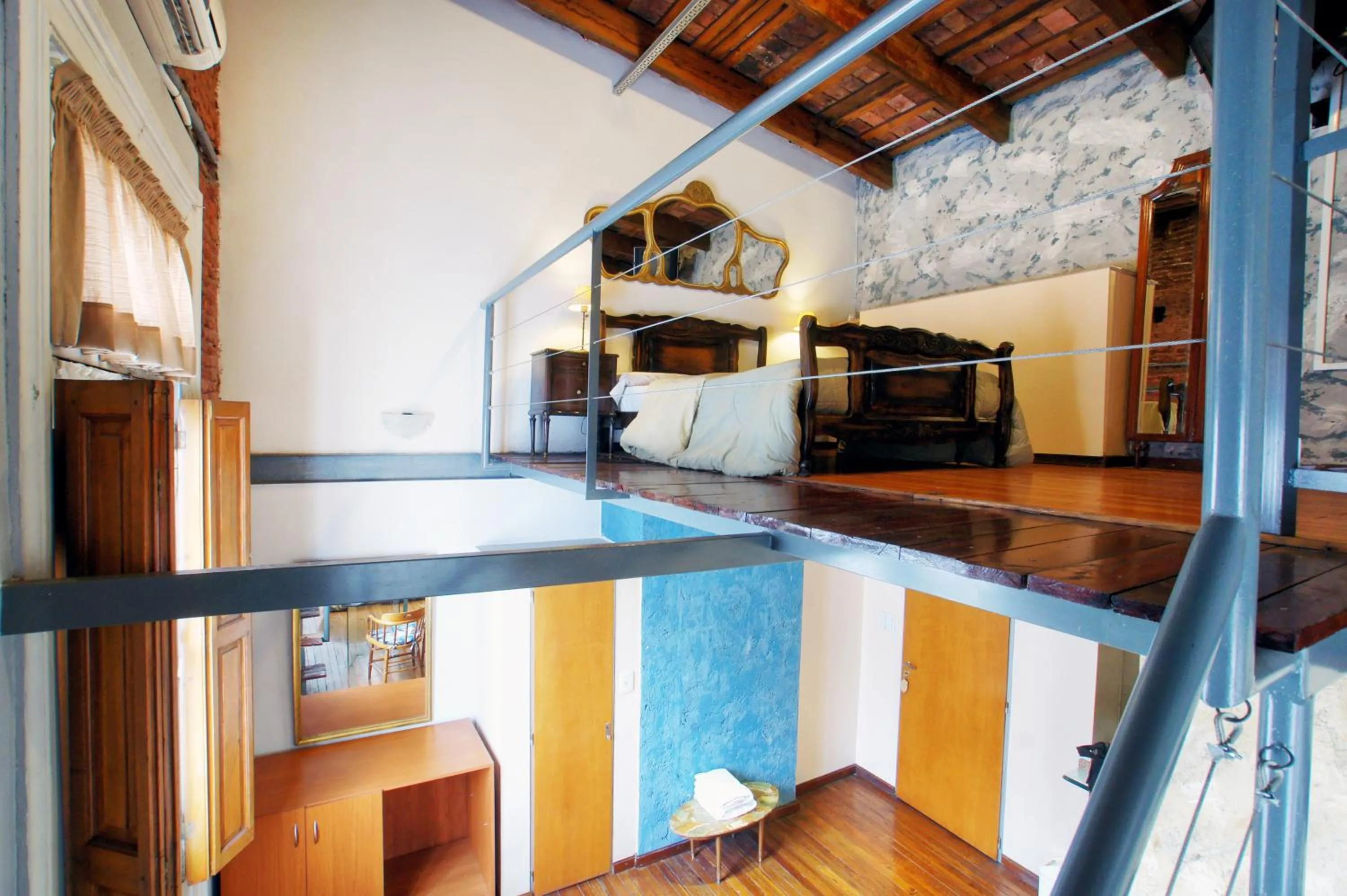 Bedroom in La Fresque Hotel