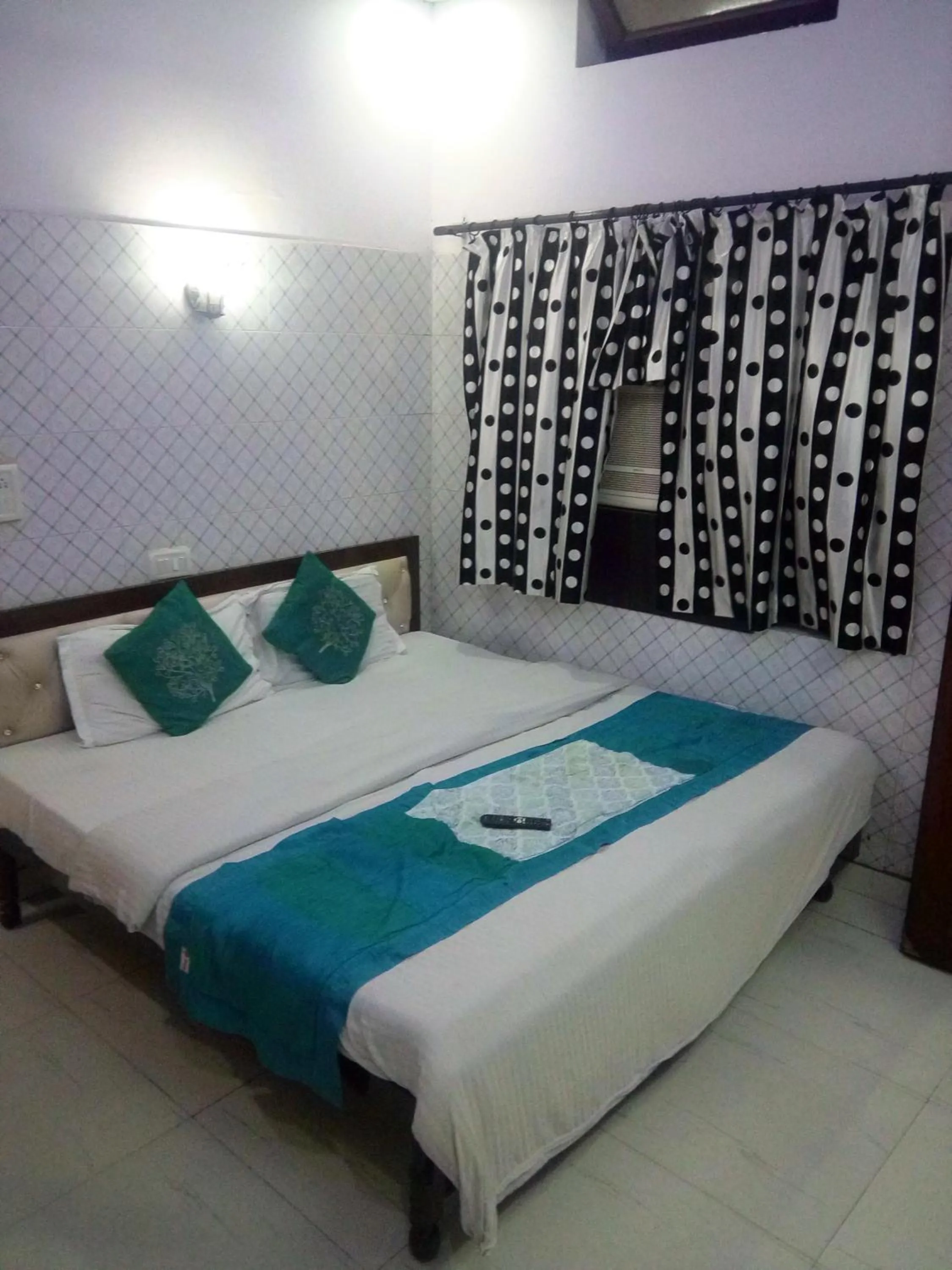 Bed in Hotel Embassy