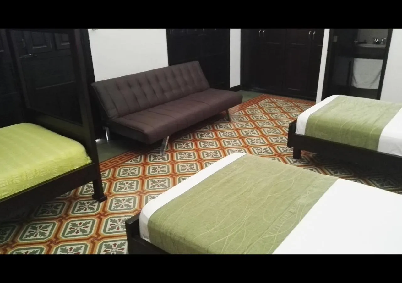 Photo of the whole room, Bed in Casa Escobar Buga