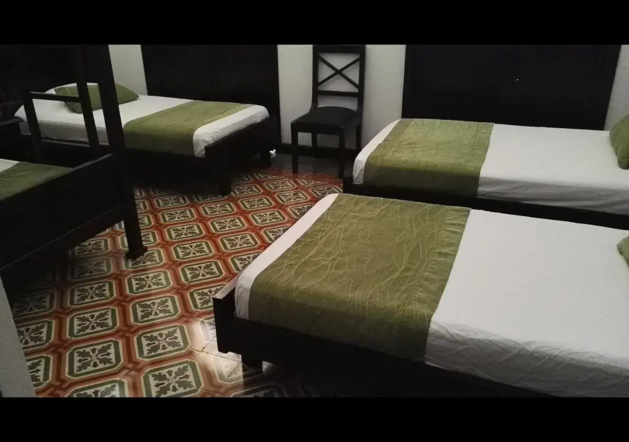 Quadruple Room in Casa Escobar Buga Quadruple Room in Casa Escobar Buga