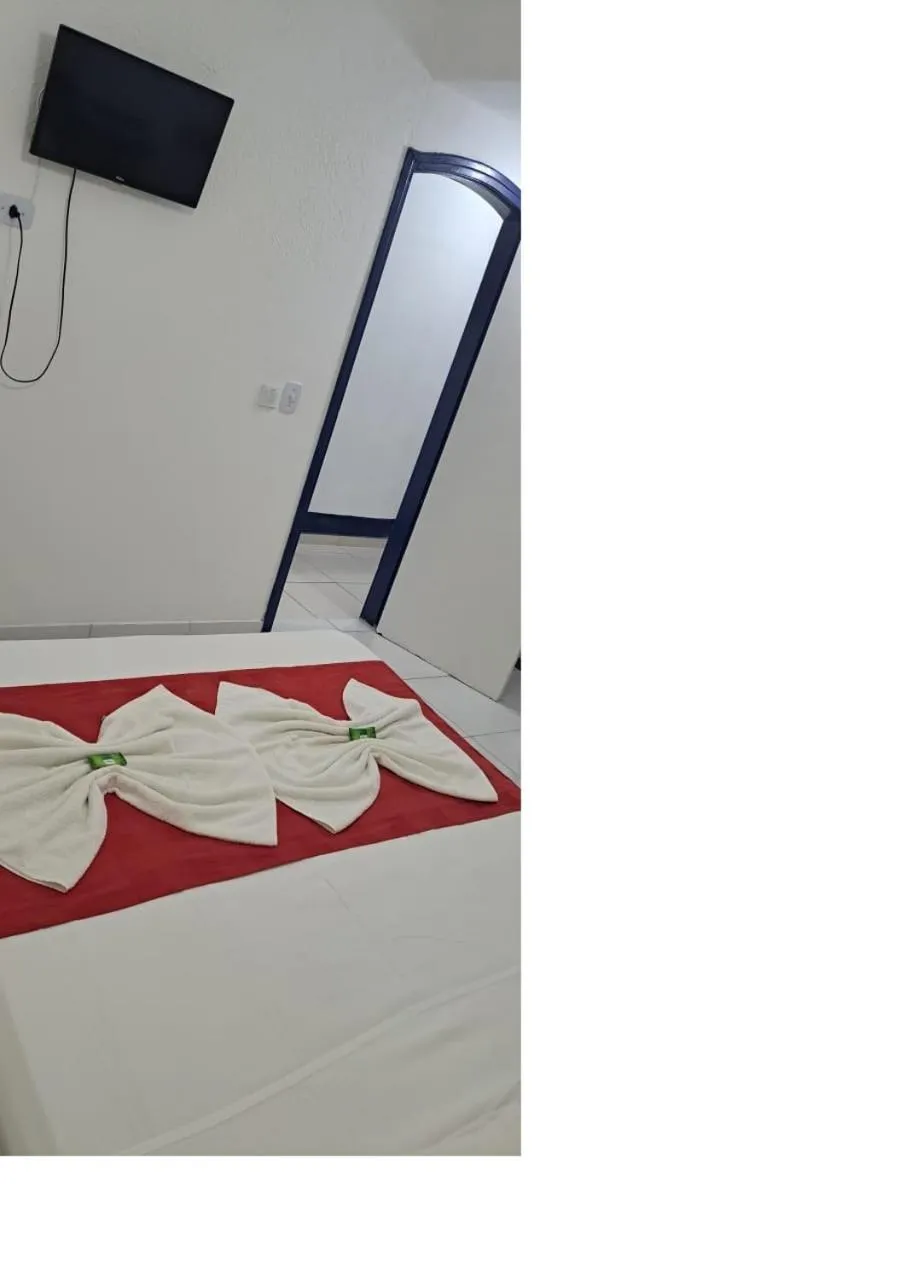 Bed in Pousada Rafimar