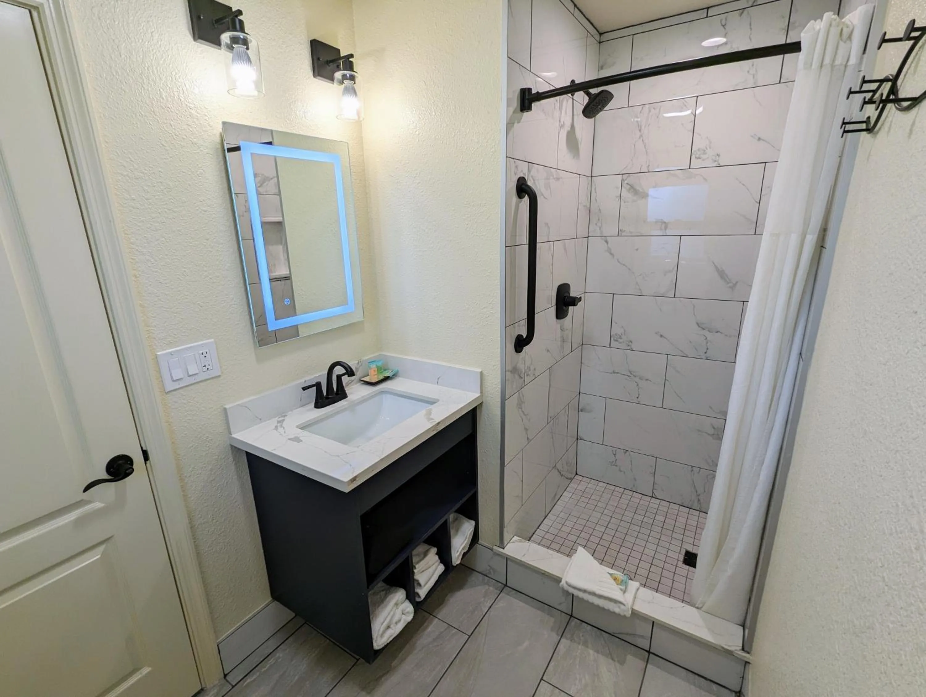 Bathroom in Clarion Collection Wilkie's Inn Pacific Grove - Monterey