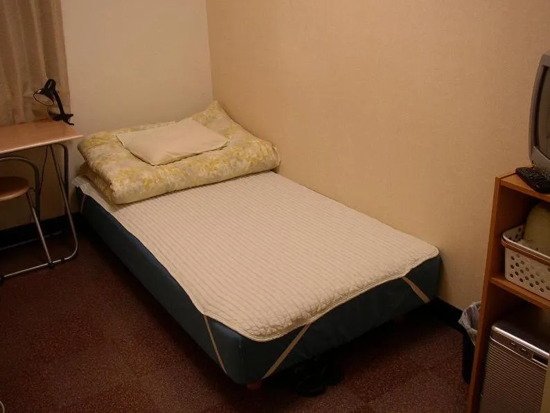 Photo of the whole room, Bed in Grace Naha