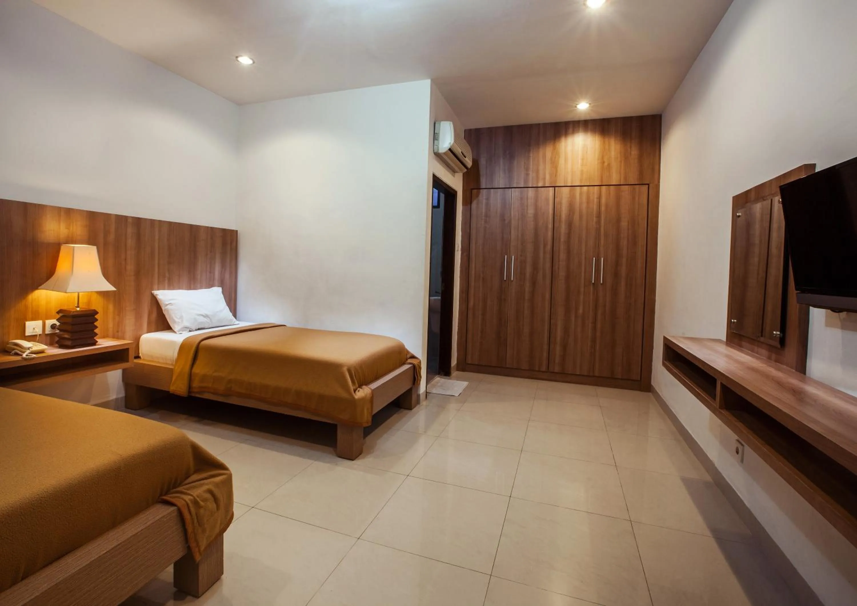 Bed in Simpang Inn Hotel