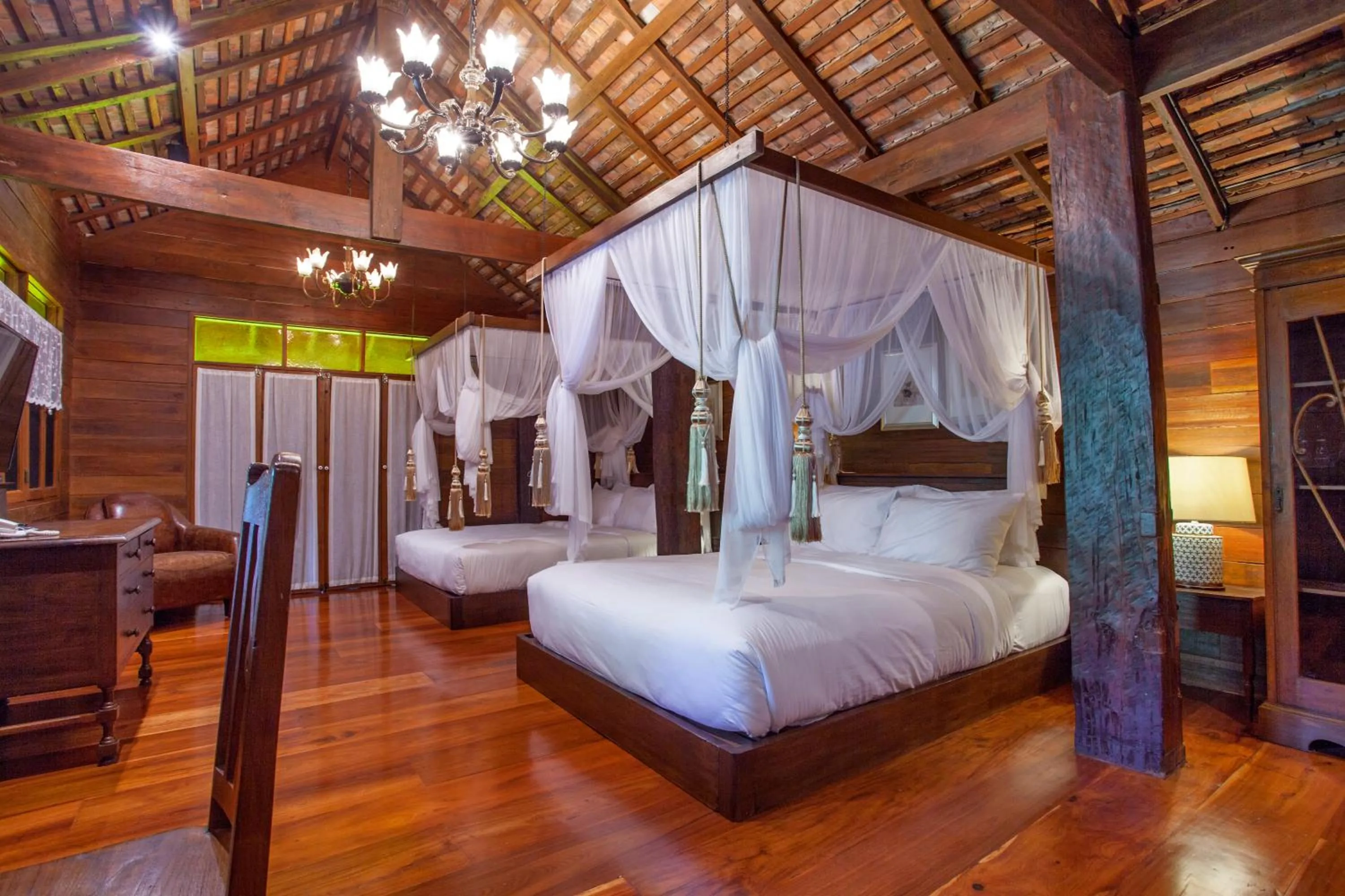 Bed in Chantra Khiri Chalet Chiang Mai