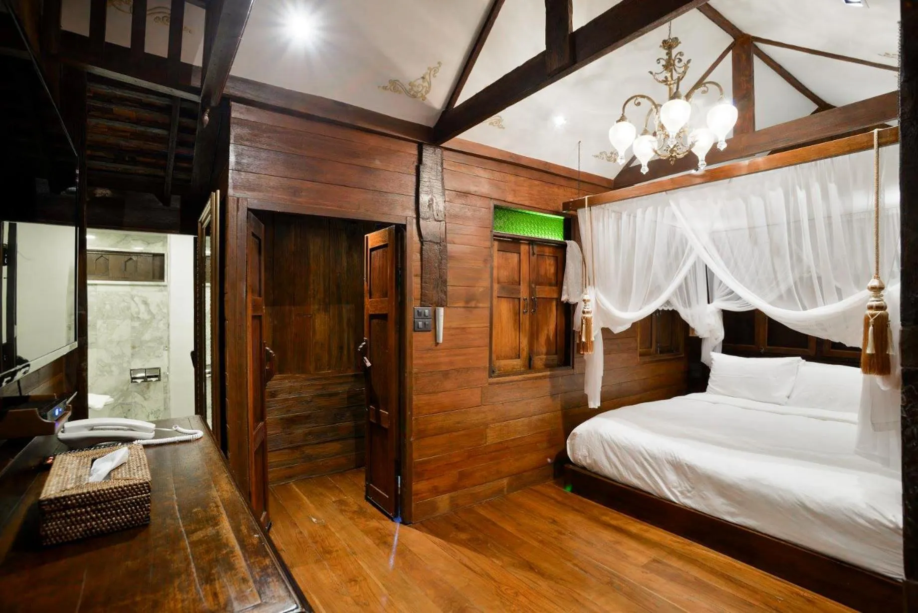 Bed in Chantra Khiri Chalet Chiang Mai