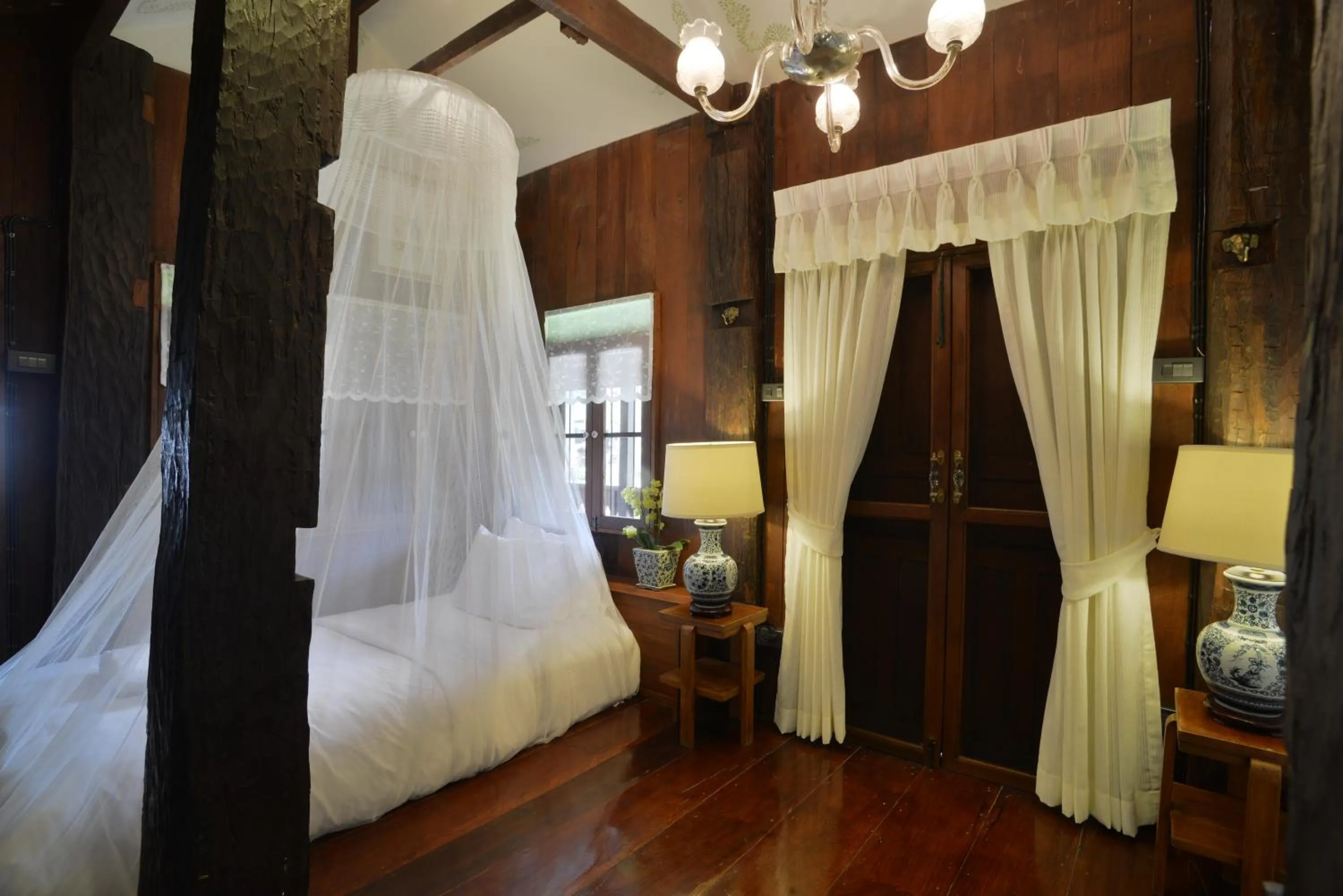 Bed in Chantra Khiri Chalet Chiang Mai