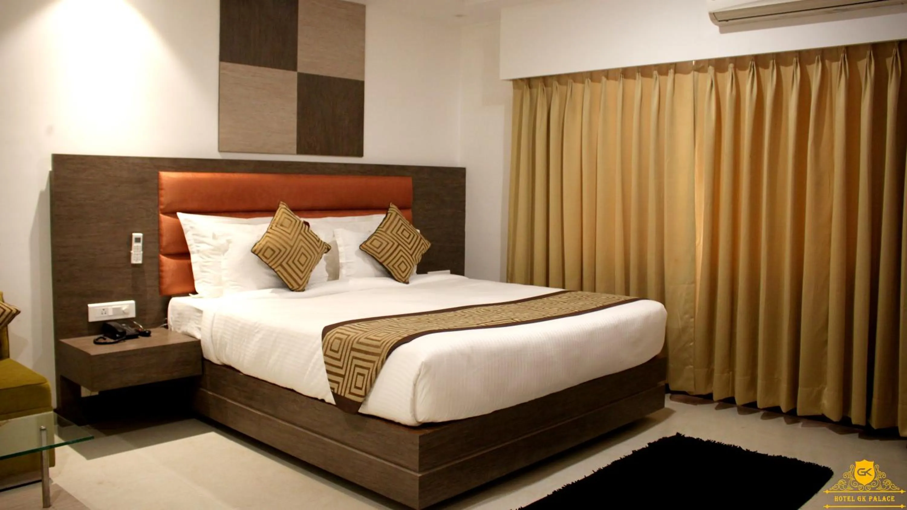 Bed in GK PALACE Pure VEG Hotel