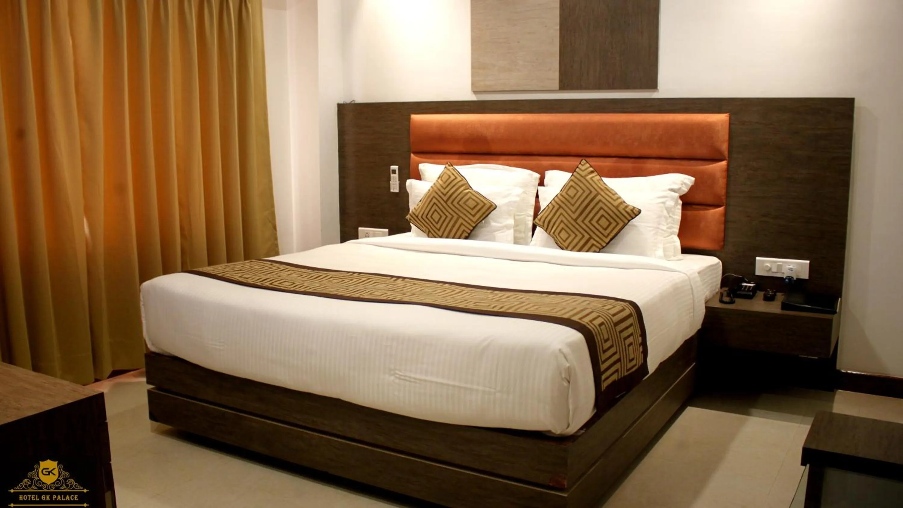 Bed in GK PALACE Pure VEG Hotel