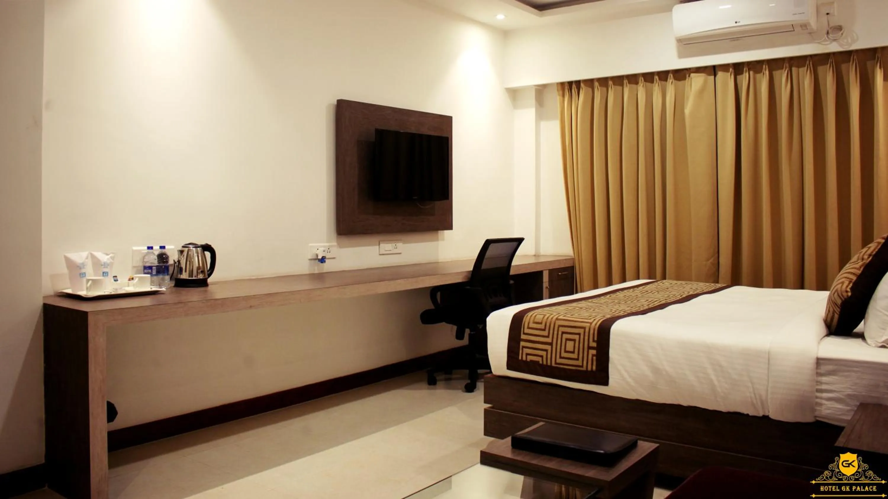 Bed in GK PALACE Pure VEG Hotel