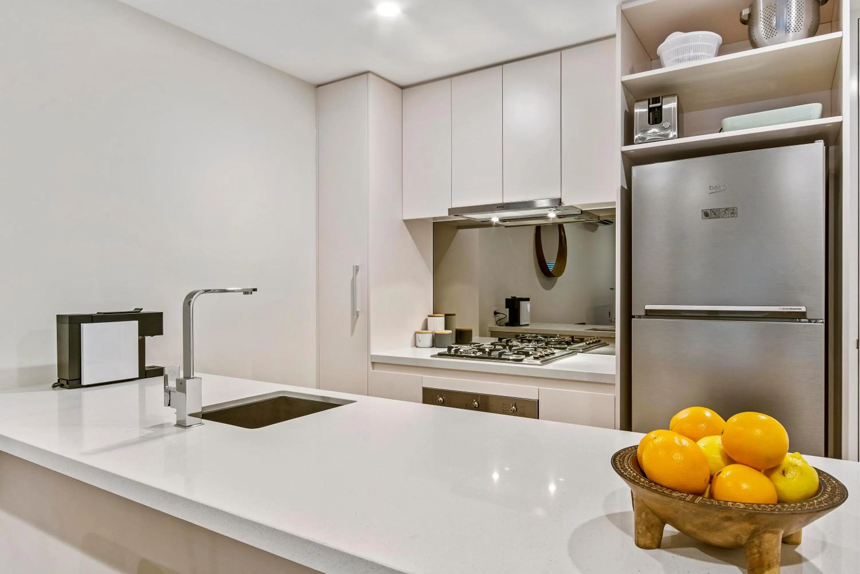 Kitchen or kitchenette in Melbourne City Apartments - Teri