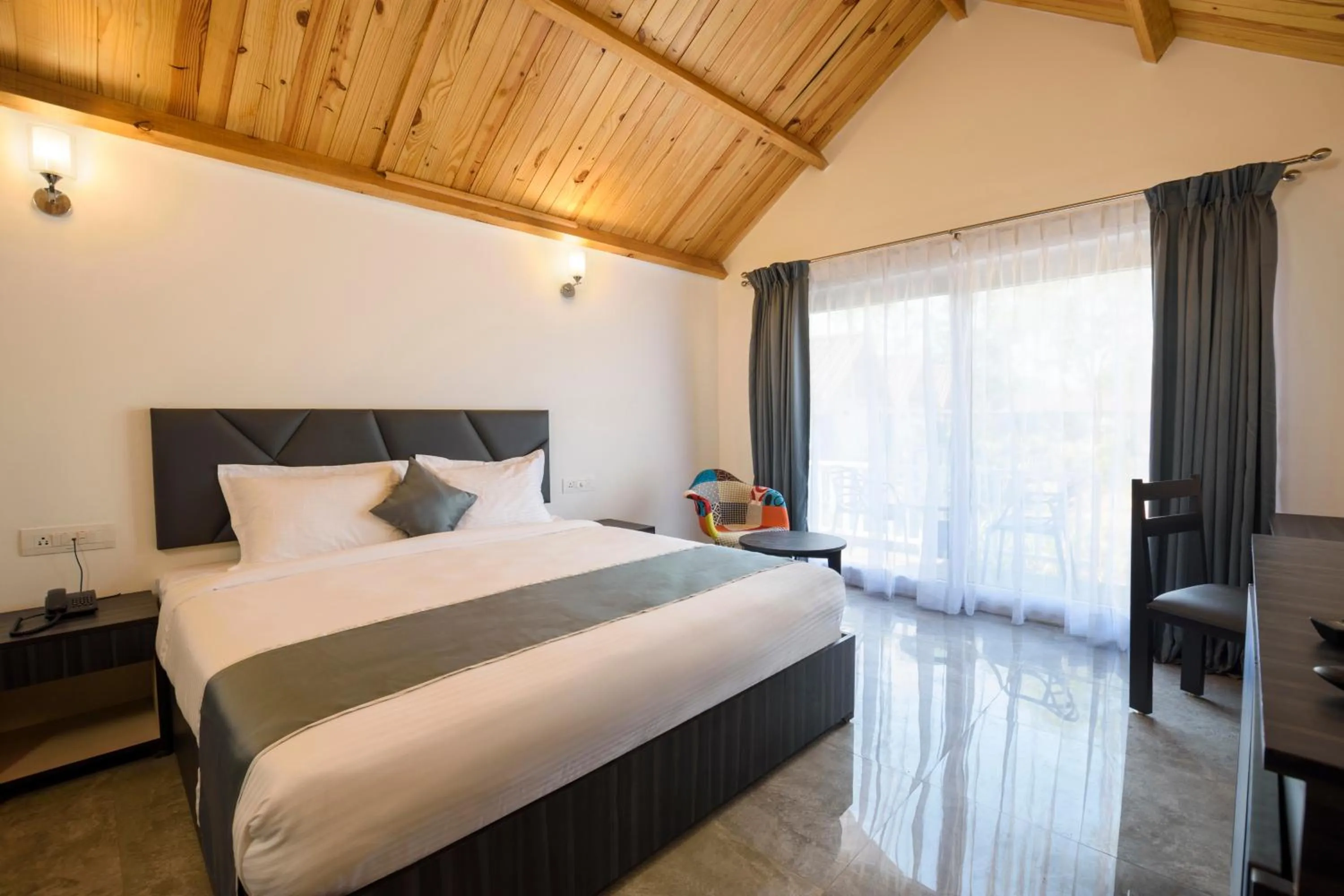 Bed in White Wood Resort By Stone Wood Hotels