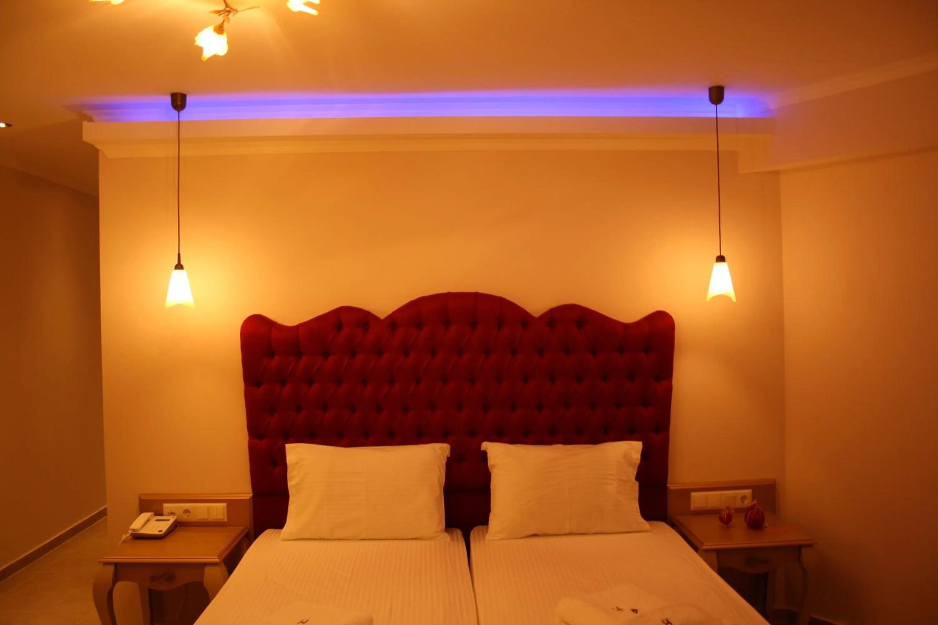 Bed in Palatino Hotel