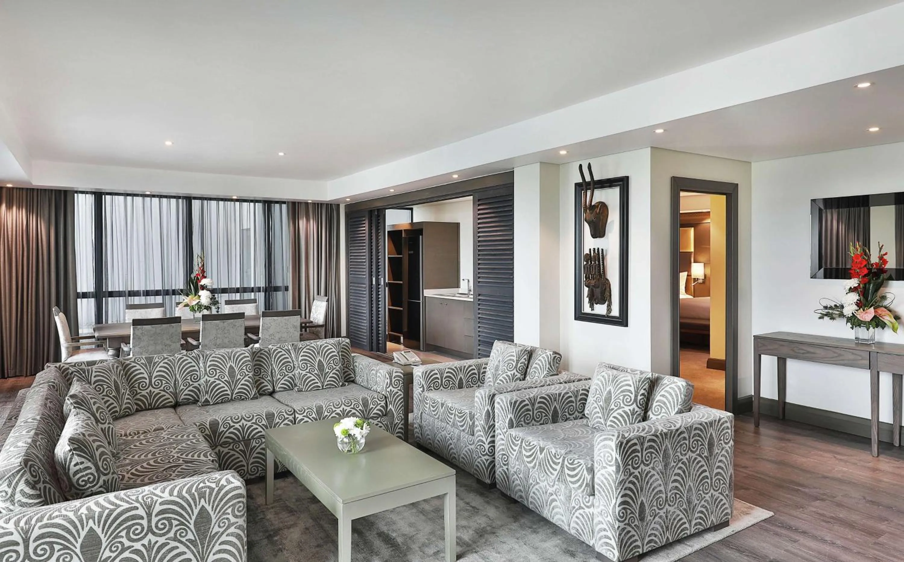 Living room in Legend Hotel Lagos Airport, Curio Collection By Hilton