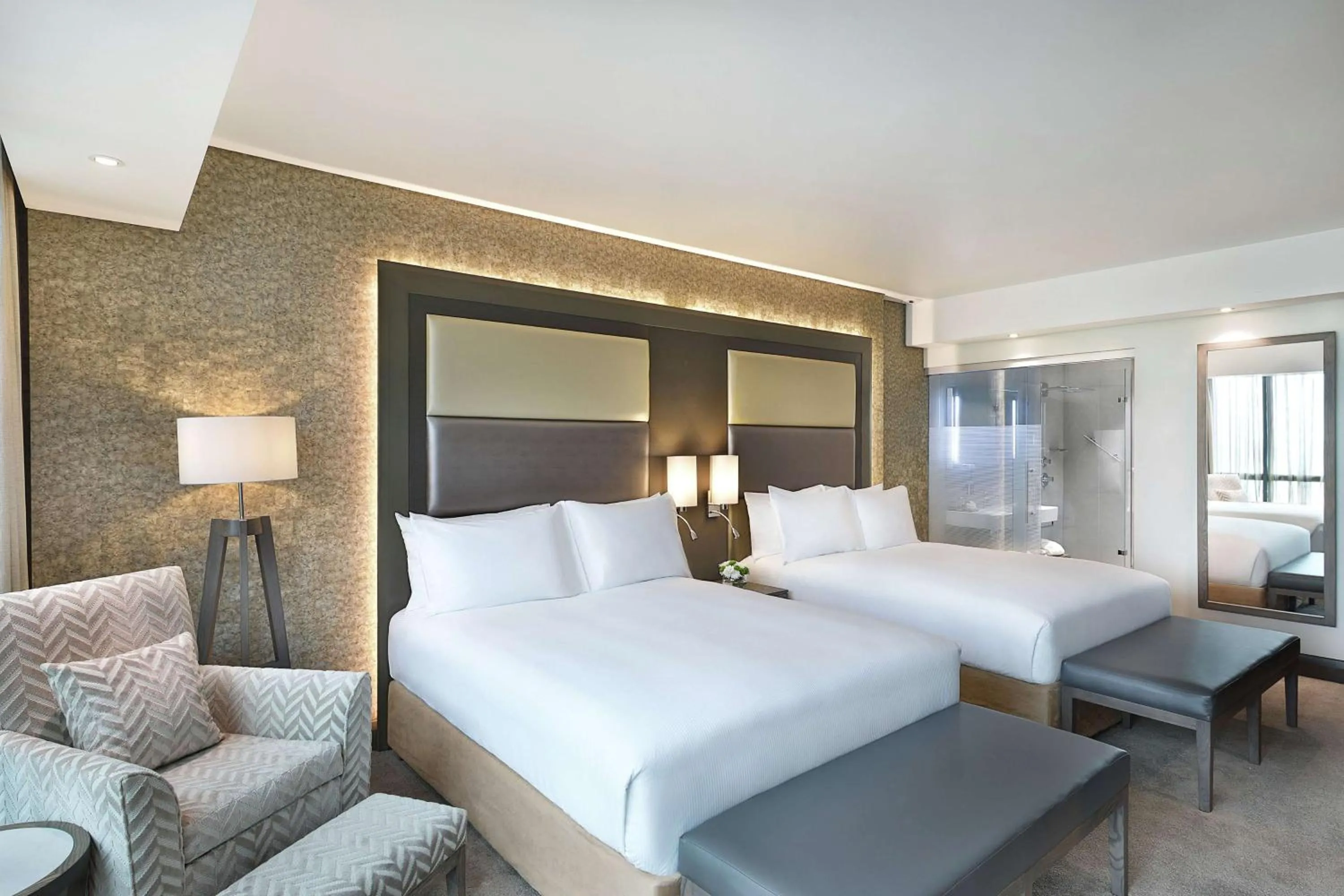 Living room, Bed in Legend Hotel Lagos Airport, Curio Collection By Hilton