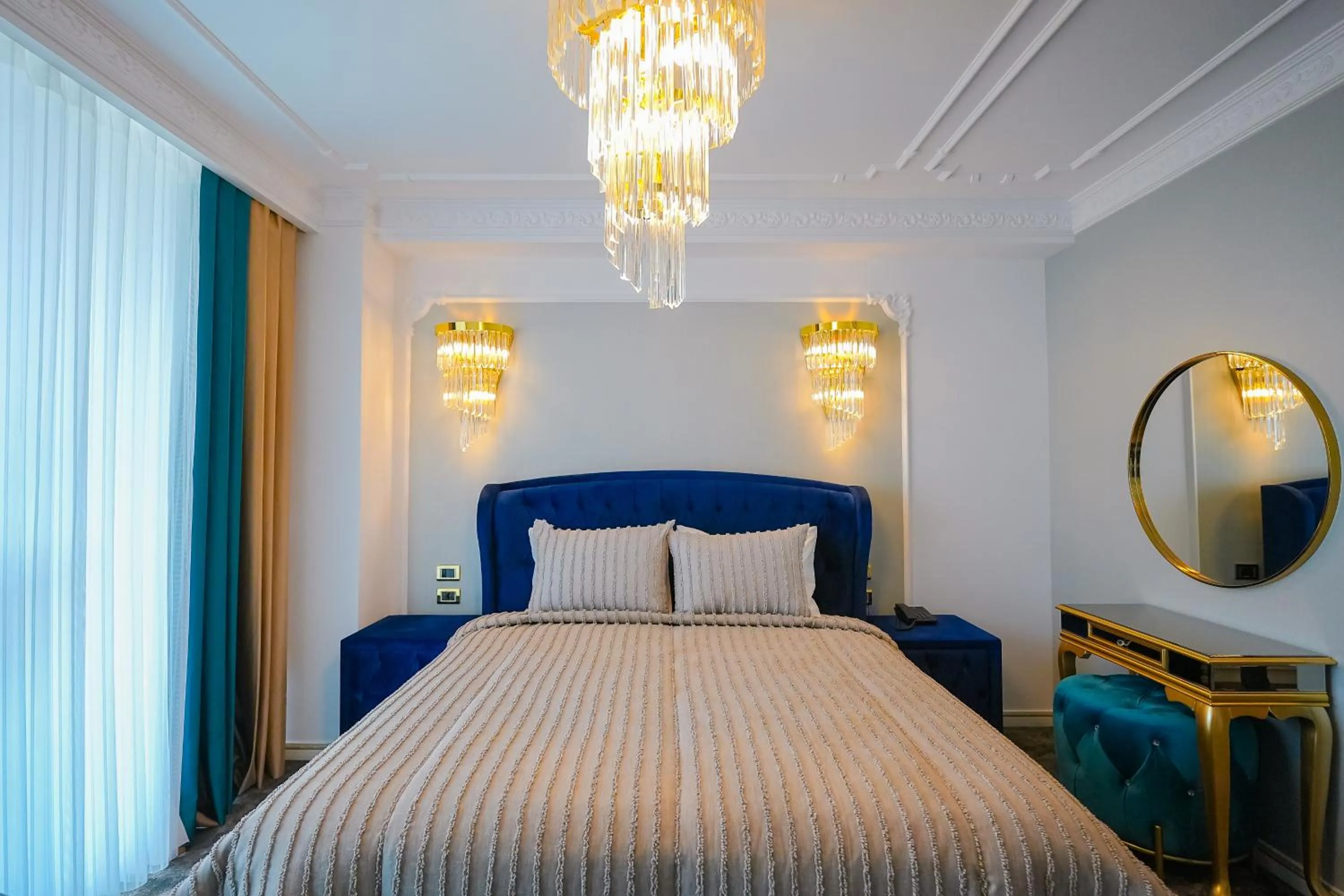 Bed in W Regal Boutique Hotel&Spa