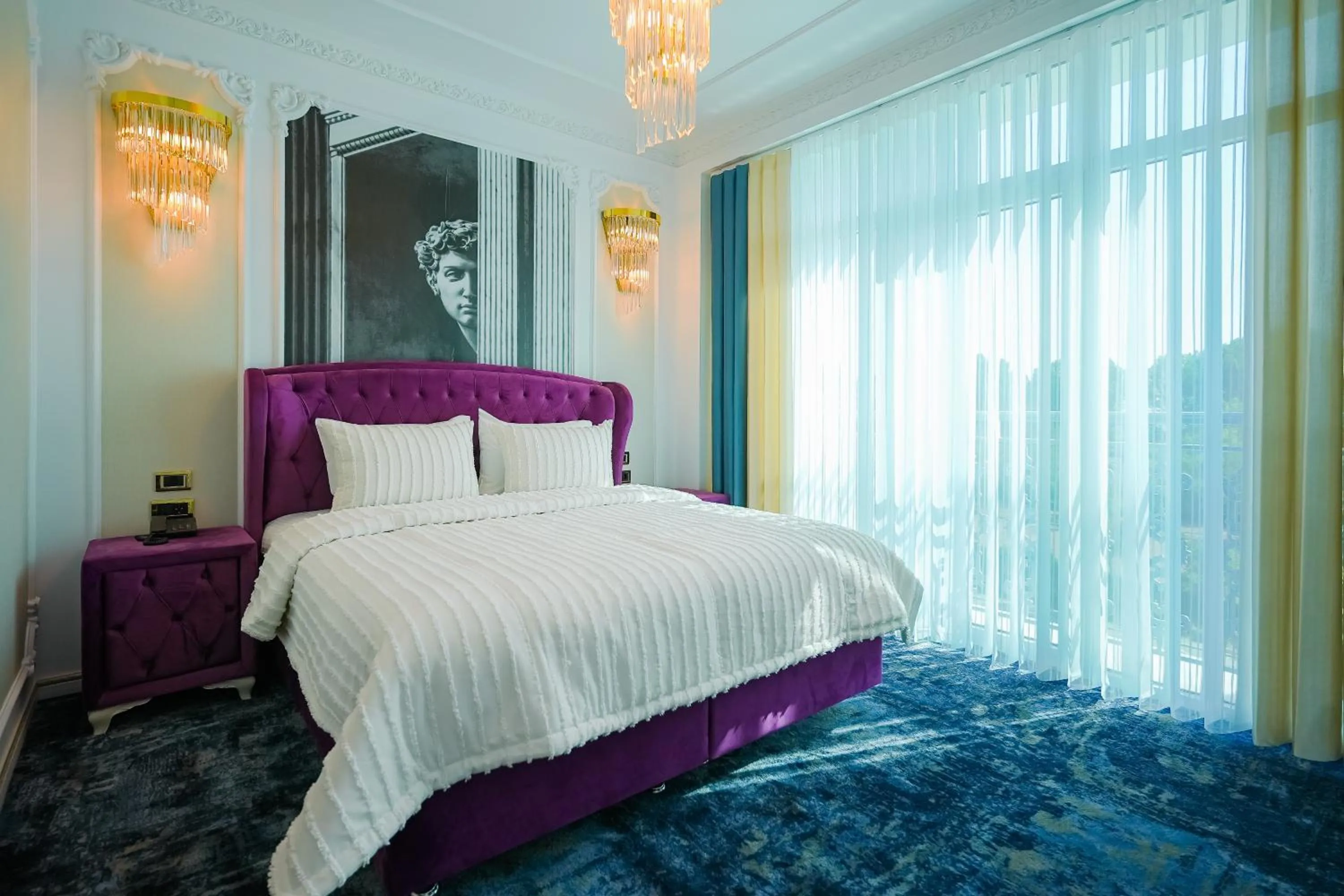 Bed in W Regal Boutique Hotel&Spa