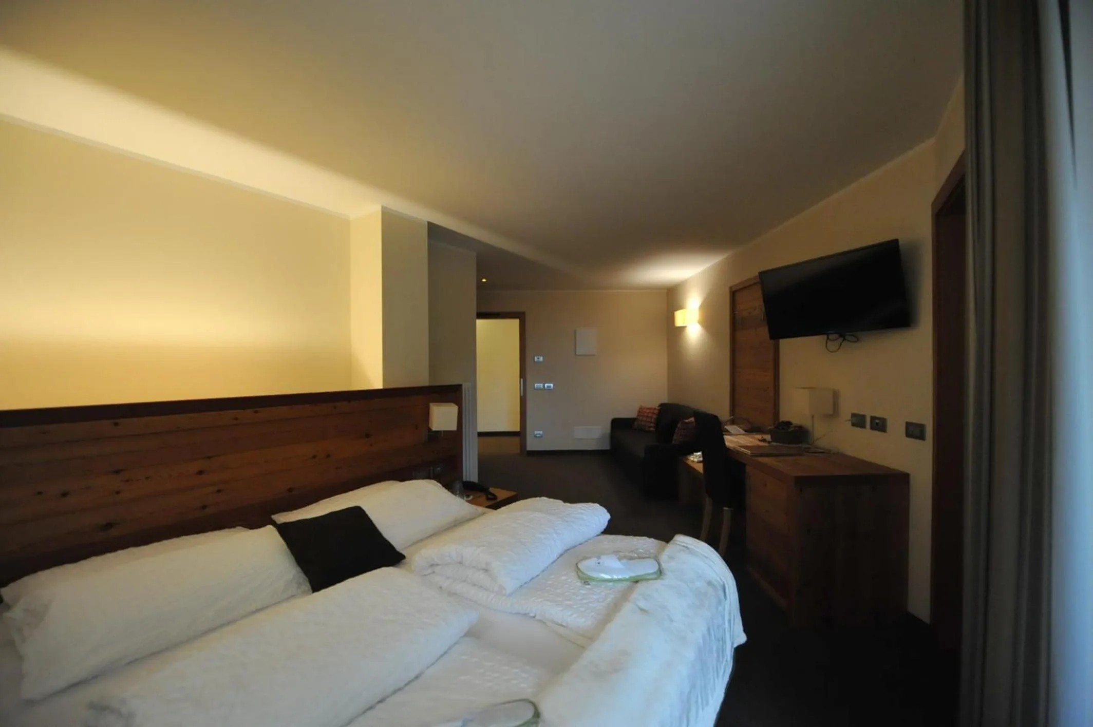 Bed in Bio Hotel Brusago Vital & Wellness
