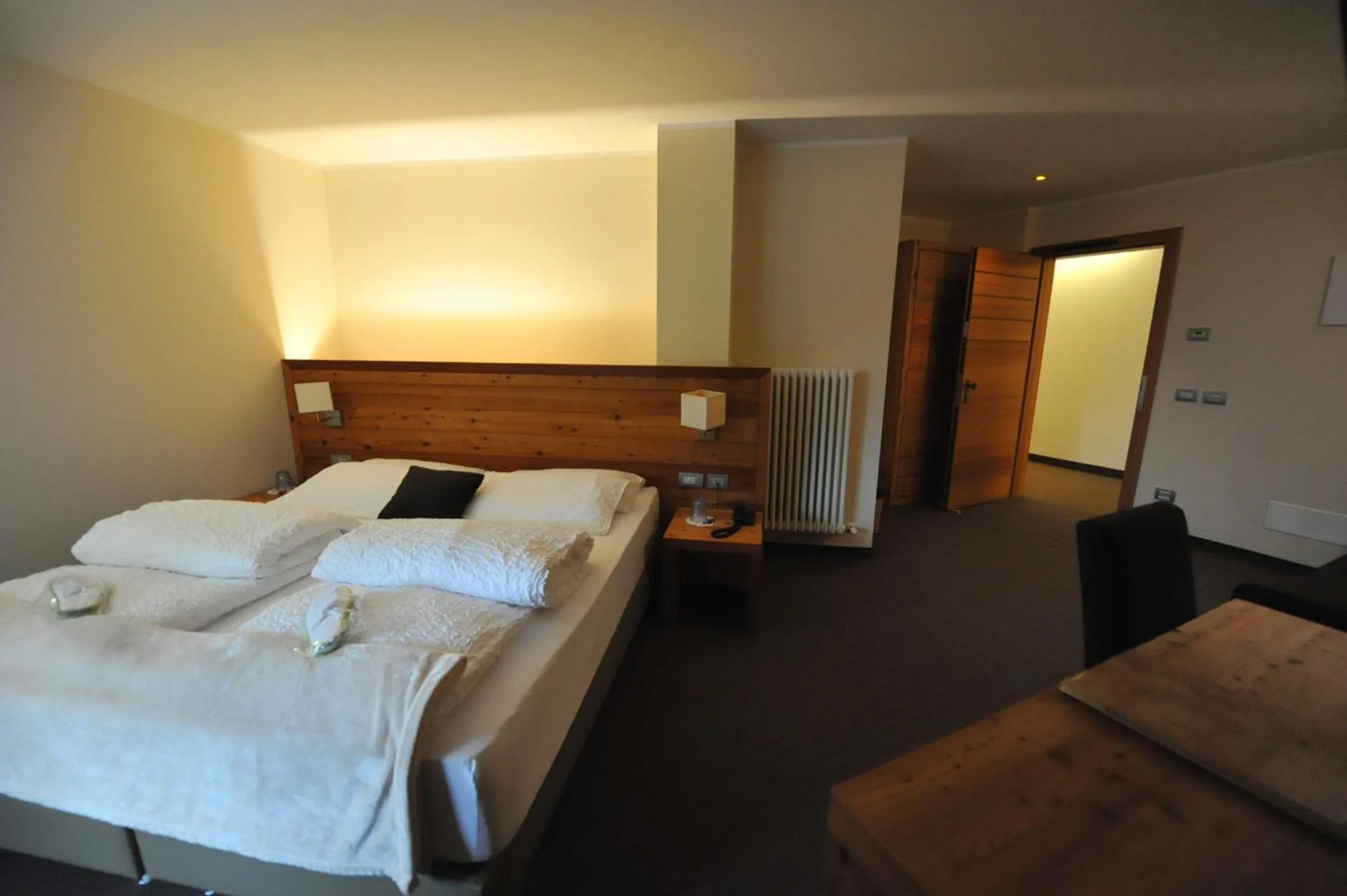 Bed in Bio Hotel Brusago Vital & Wellness