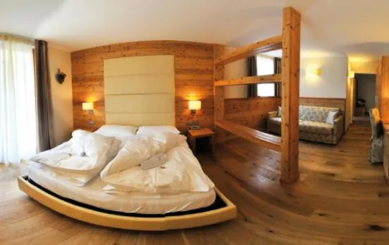 Bed in Bio Hotel Brusago Vital & Wellness