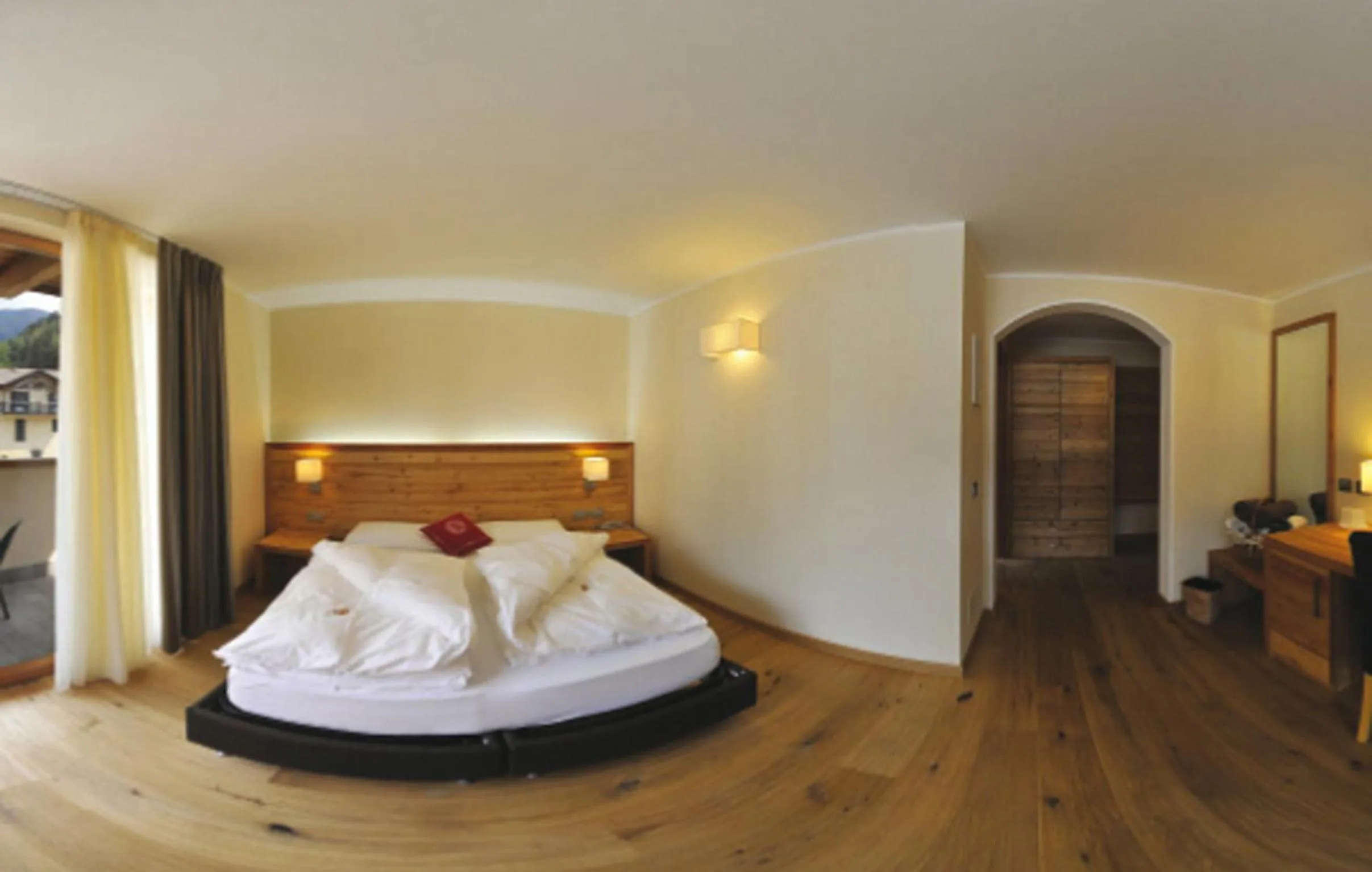 Photo of the whole room, Bed in Bio Hotel Brusago Vital & Wellness