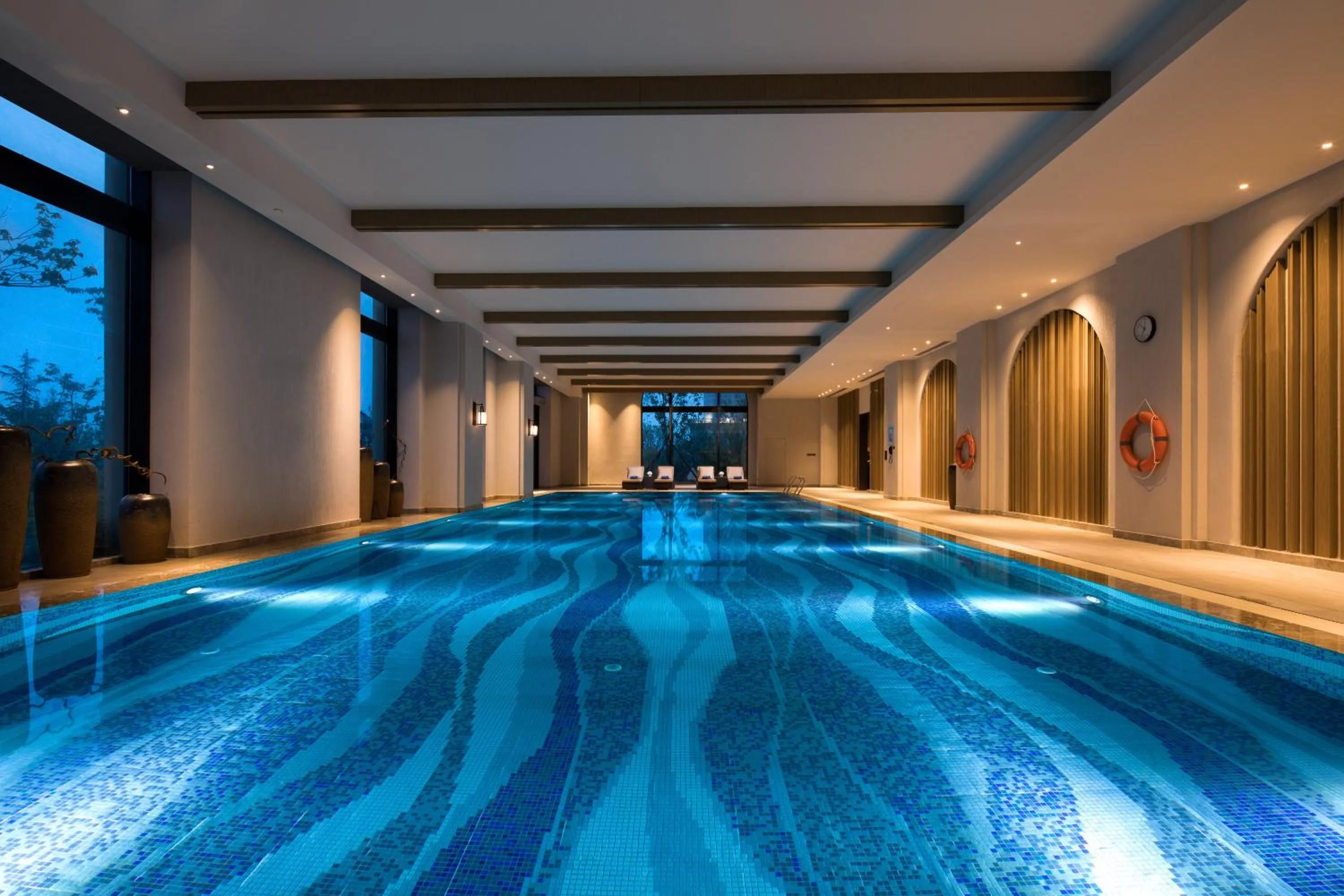 Swimming pool in Crowne Plaza QingdaoOriental Movie Metropolis by IHG