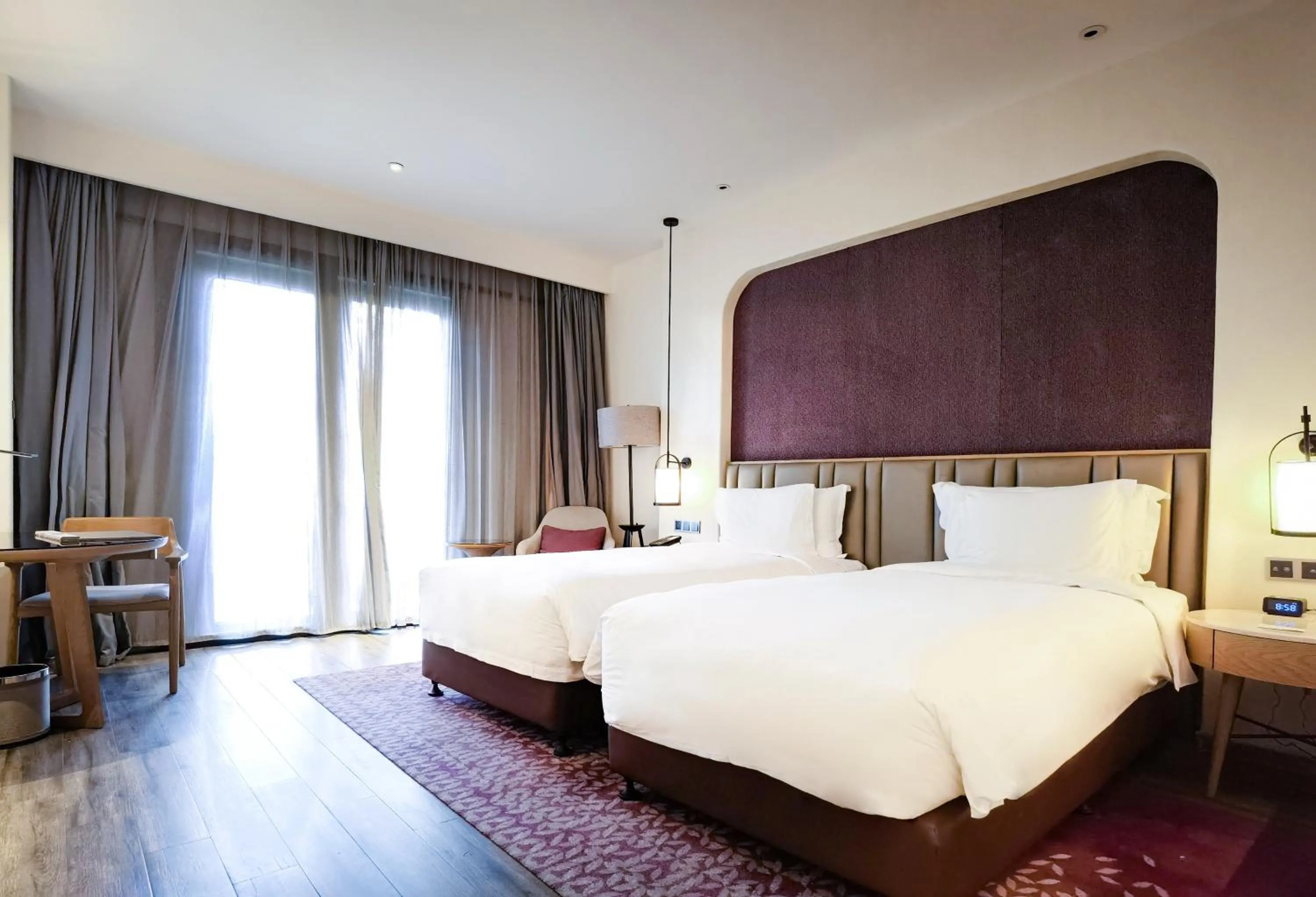 View (from property/room), Bed in Crowne Plaza QingdaoOriental Movie Metropolis by IHG