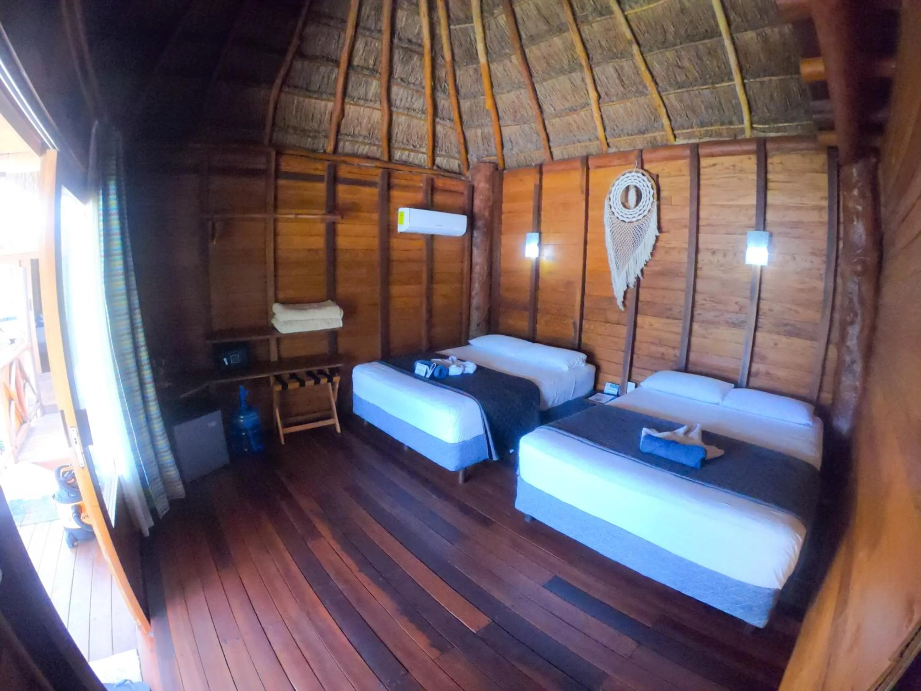 Bed in Palmeras de Mahahual Cabañas