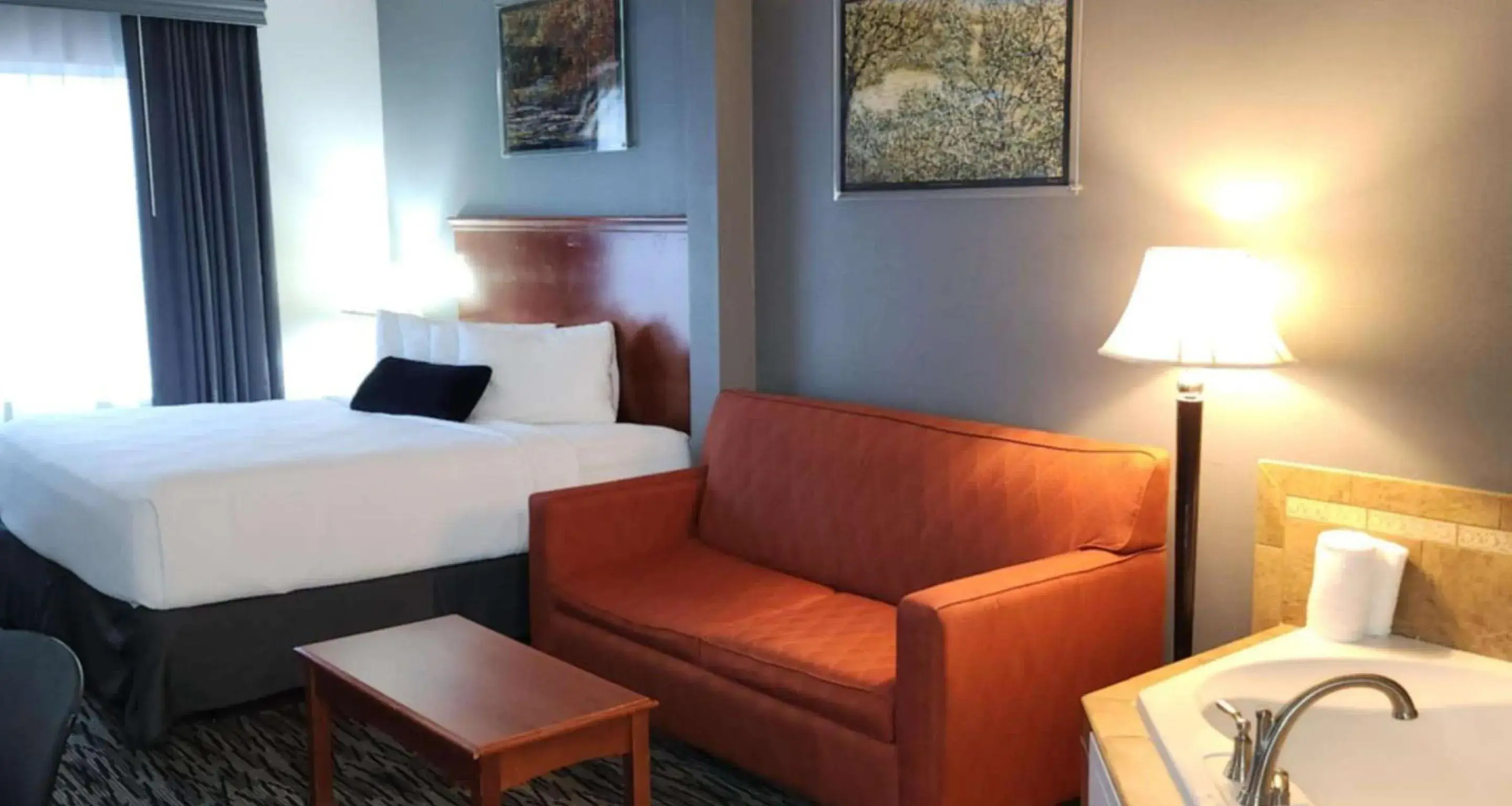 King Suite with Sofa Bed and Spa Bath in Parke Regency Hotel & Conf Ctr., BW Signature Collection King Suite with Sofa Bed and Spa Bath in Parke Regency Hotel & Conf Ctr., BW Signature Collection