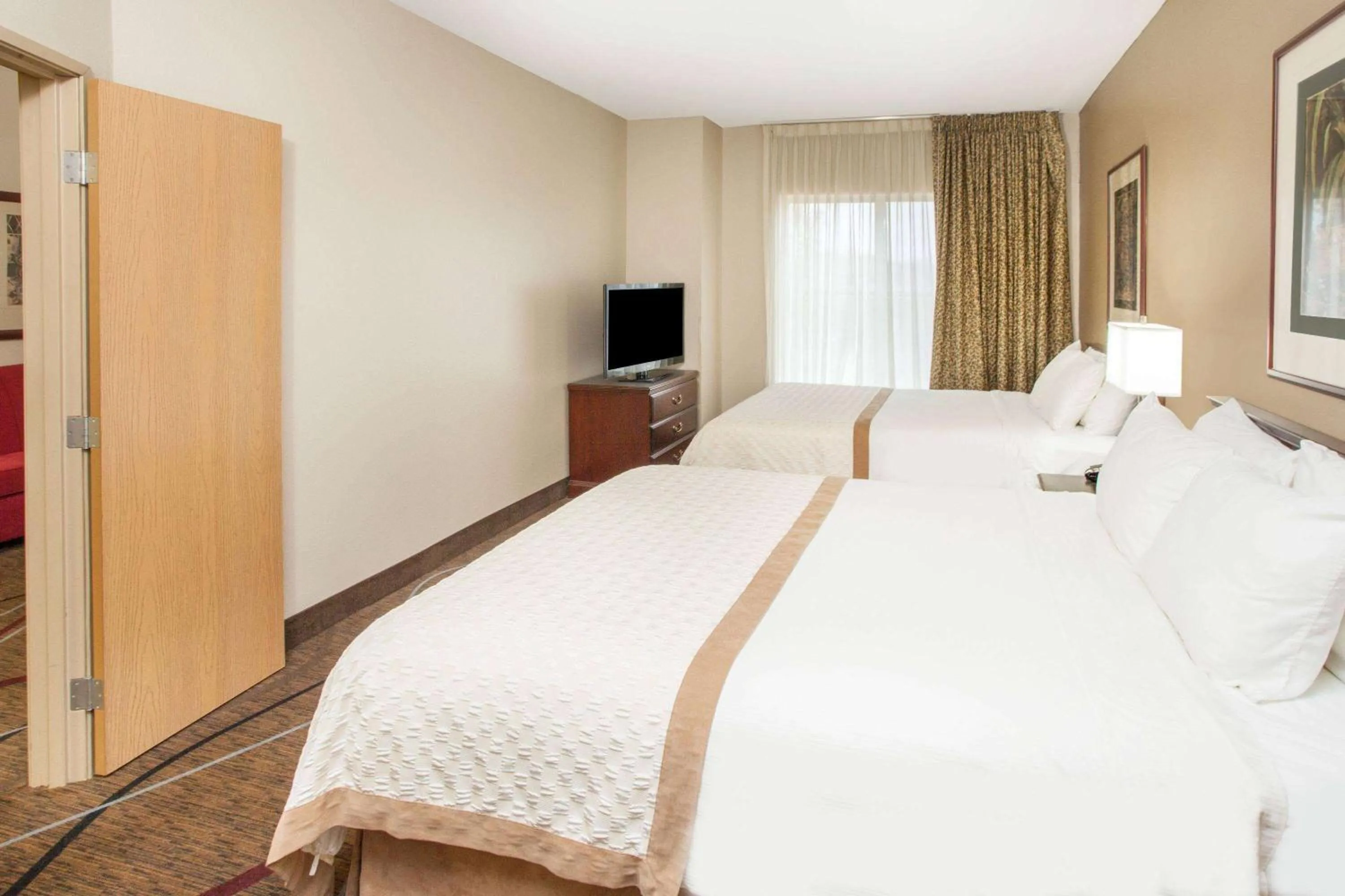 Bed in Hawthorn Extended Stay by Wyndham Bloomington