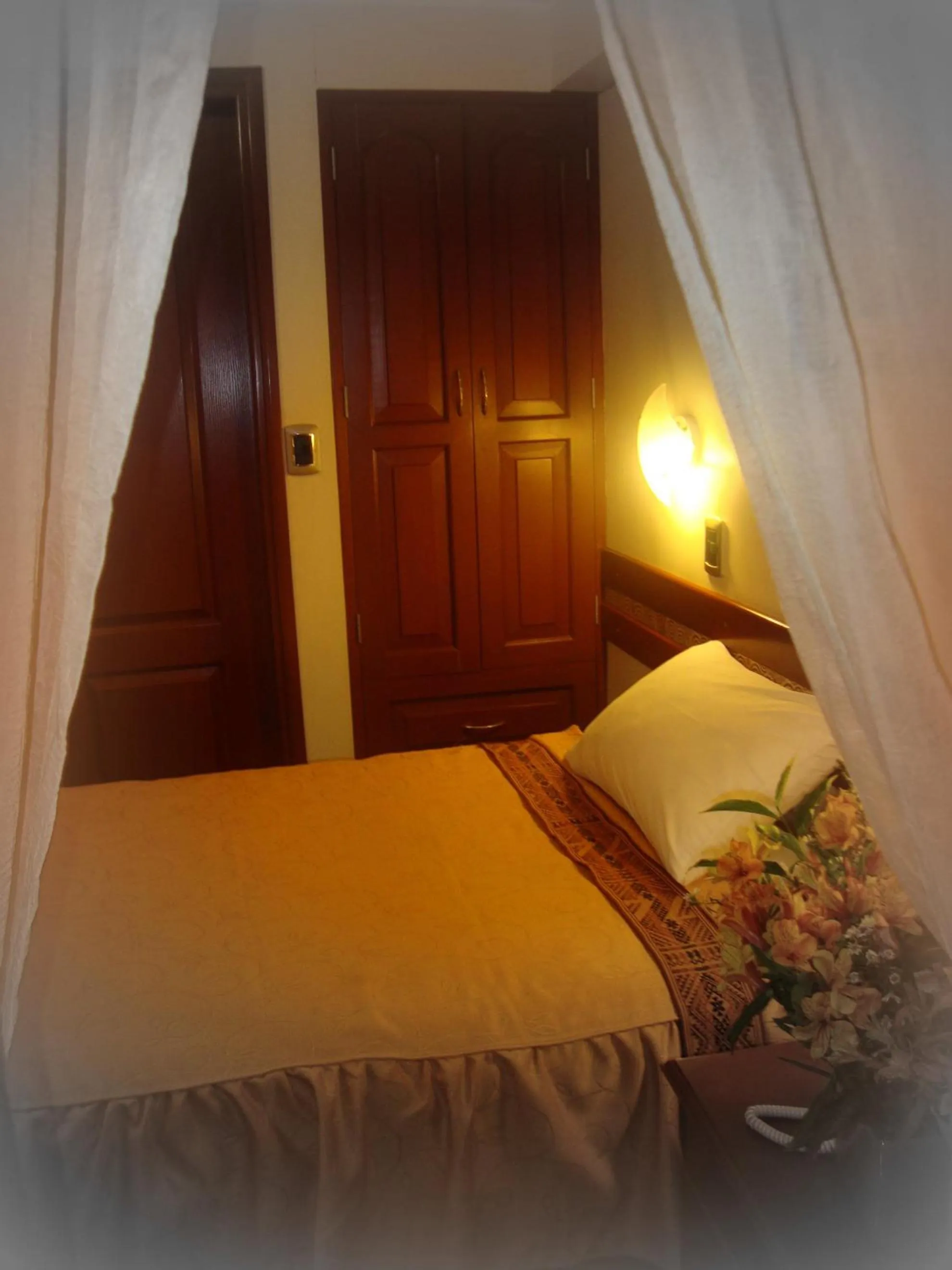 Bed in Antawasi Hotel