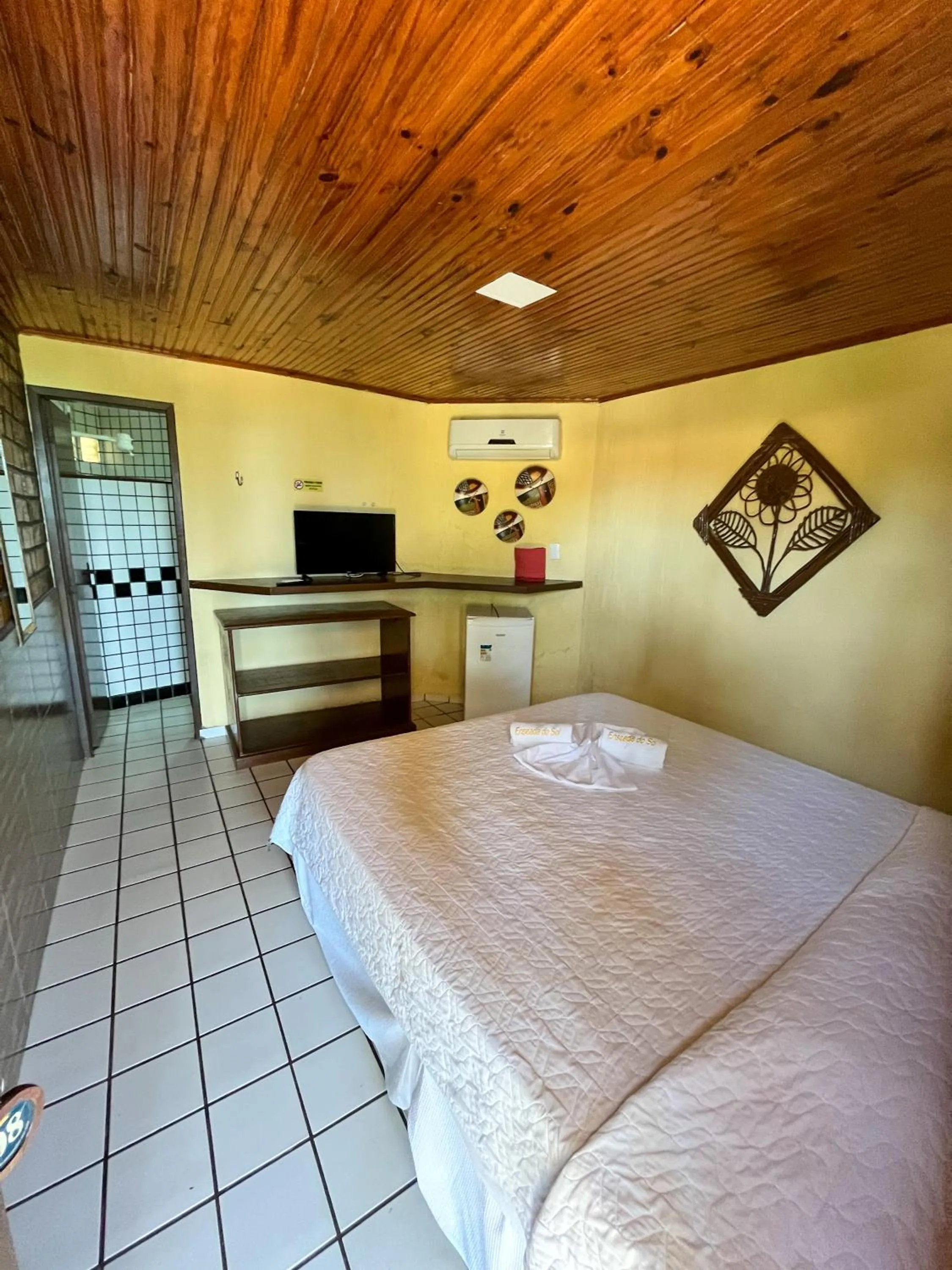 Bed in Pousada Enseada do Sol