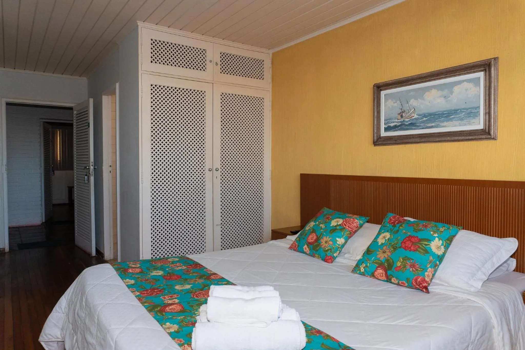 Bed in Pousada Marilia