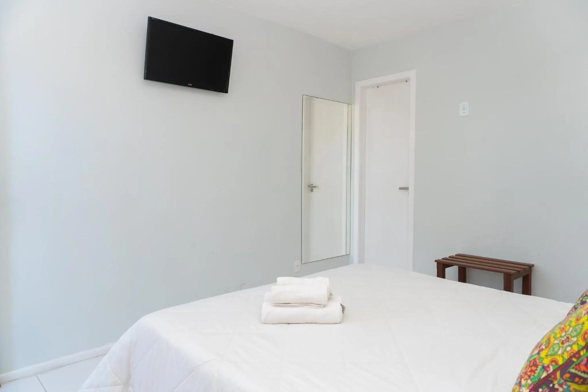 Bed in Pousada Marilia