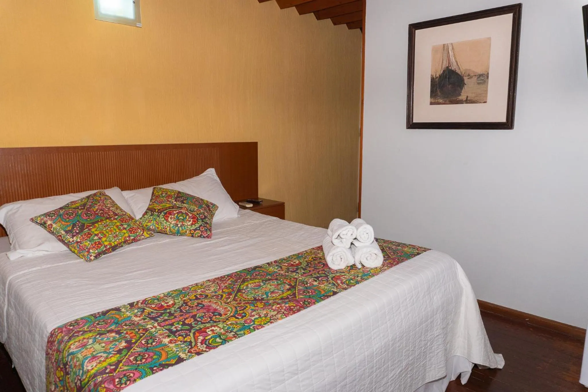 Bed in Pousada Marilia