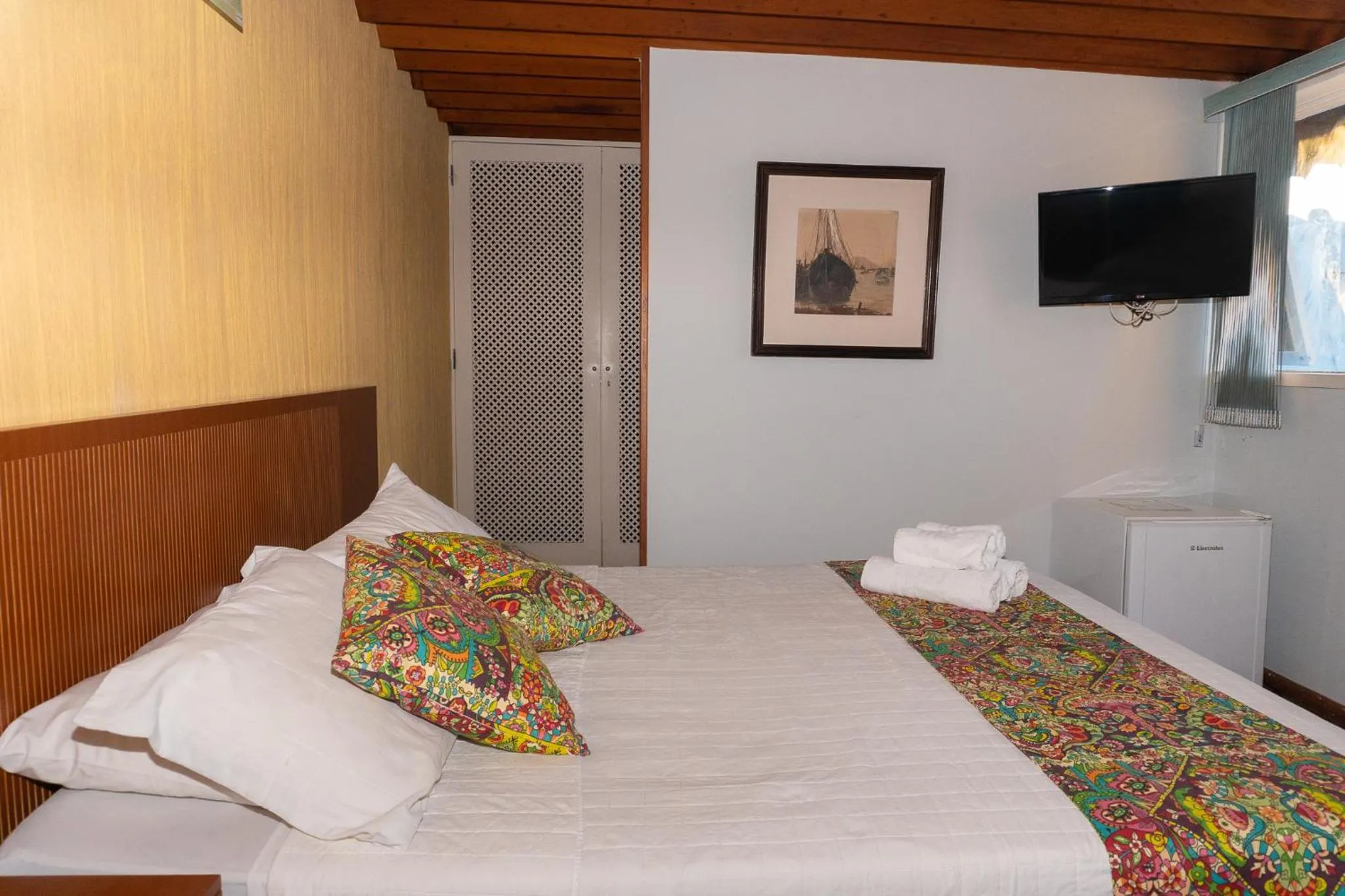 Bed in Pousada Marilia