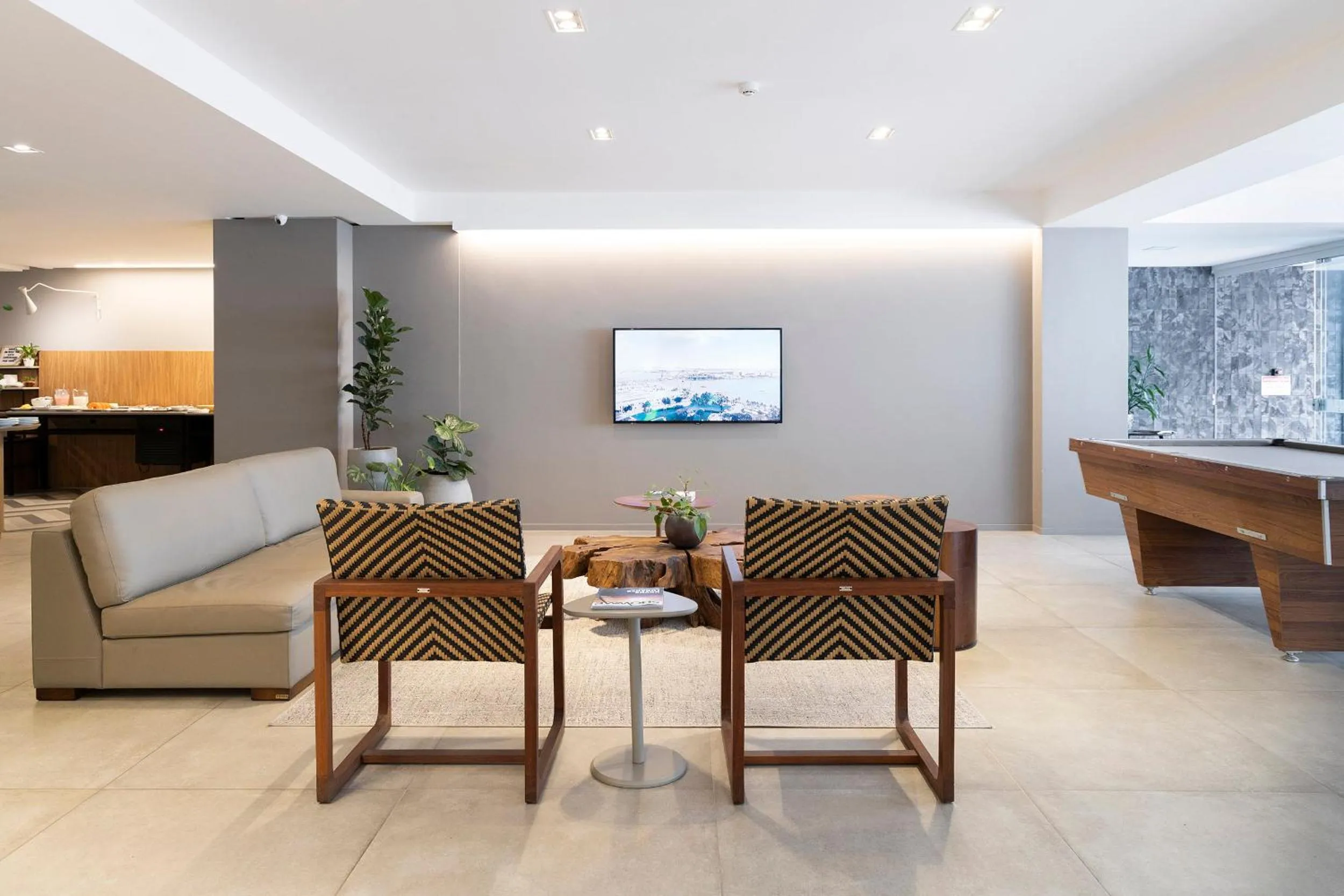 Communal lounge/ TV room in Tropikalya Gold Hotel