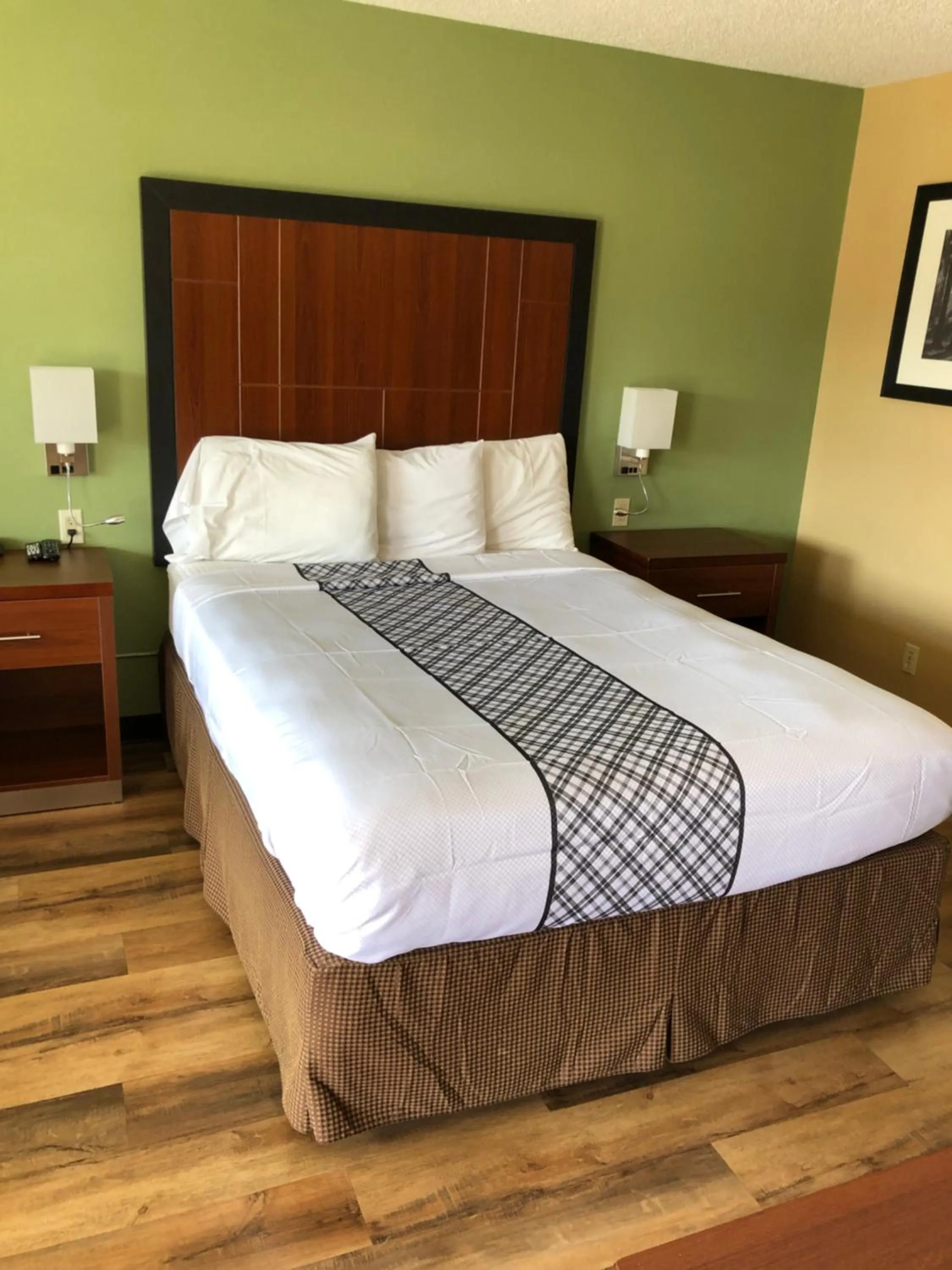 Bed in Knights Inn Motel