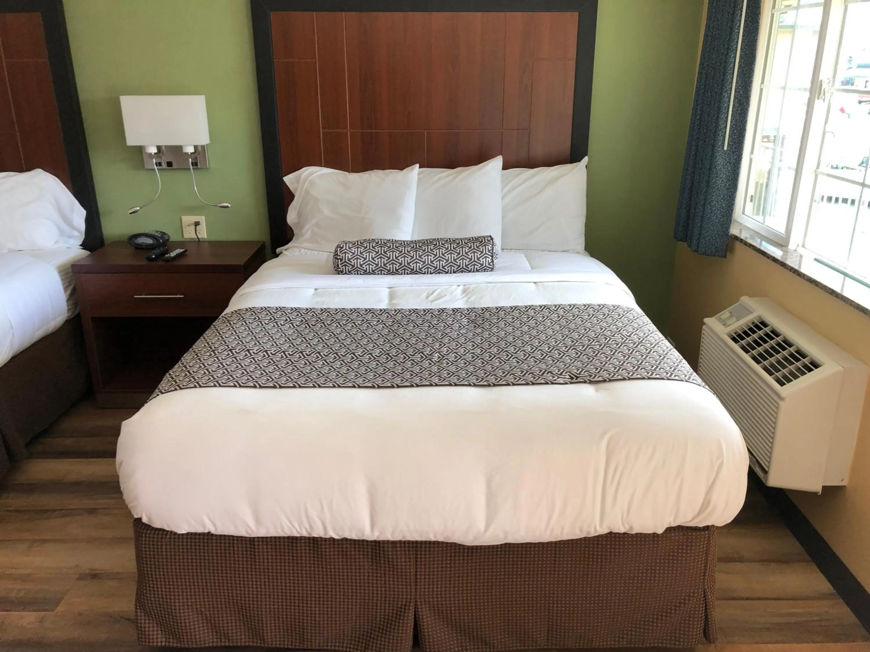 Bed in Knights Inn Motel