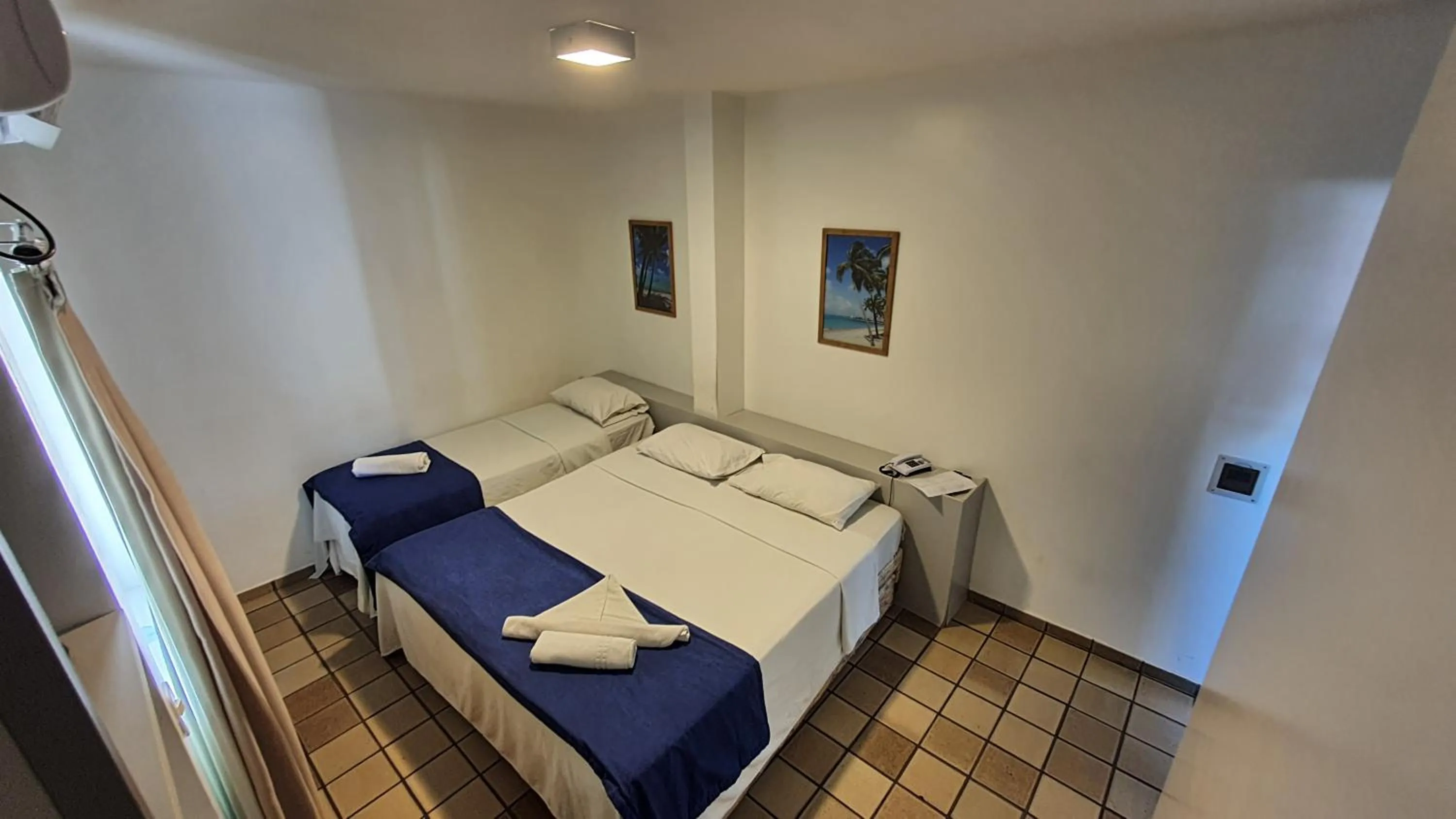 Bed in Bluemar Hotel