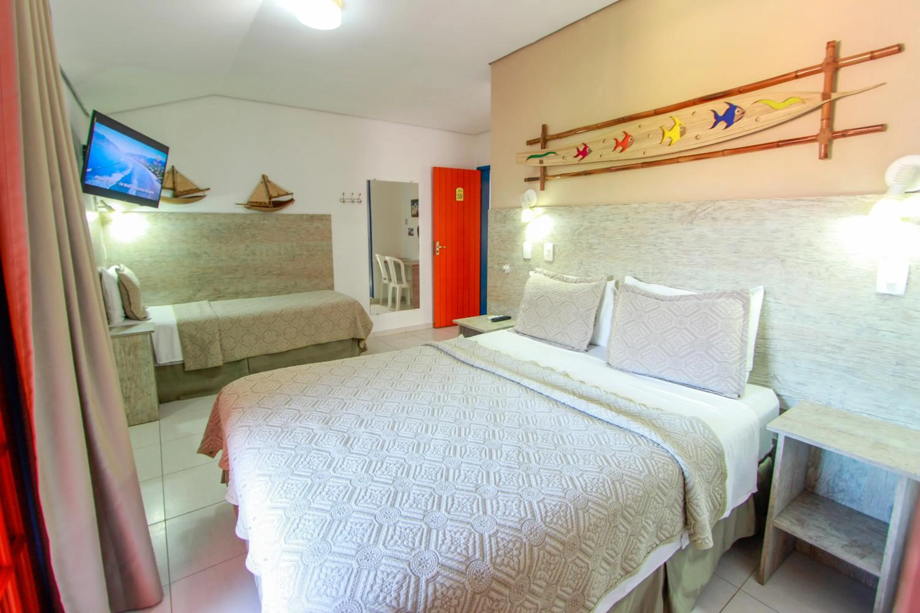 Bed in Kaliman Pousada