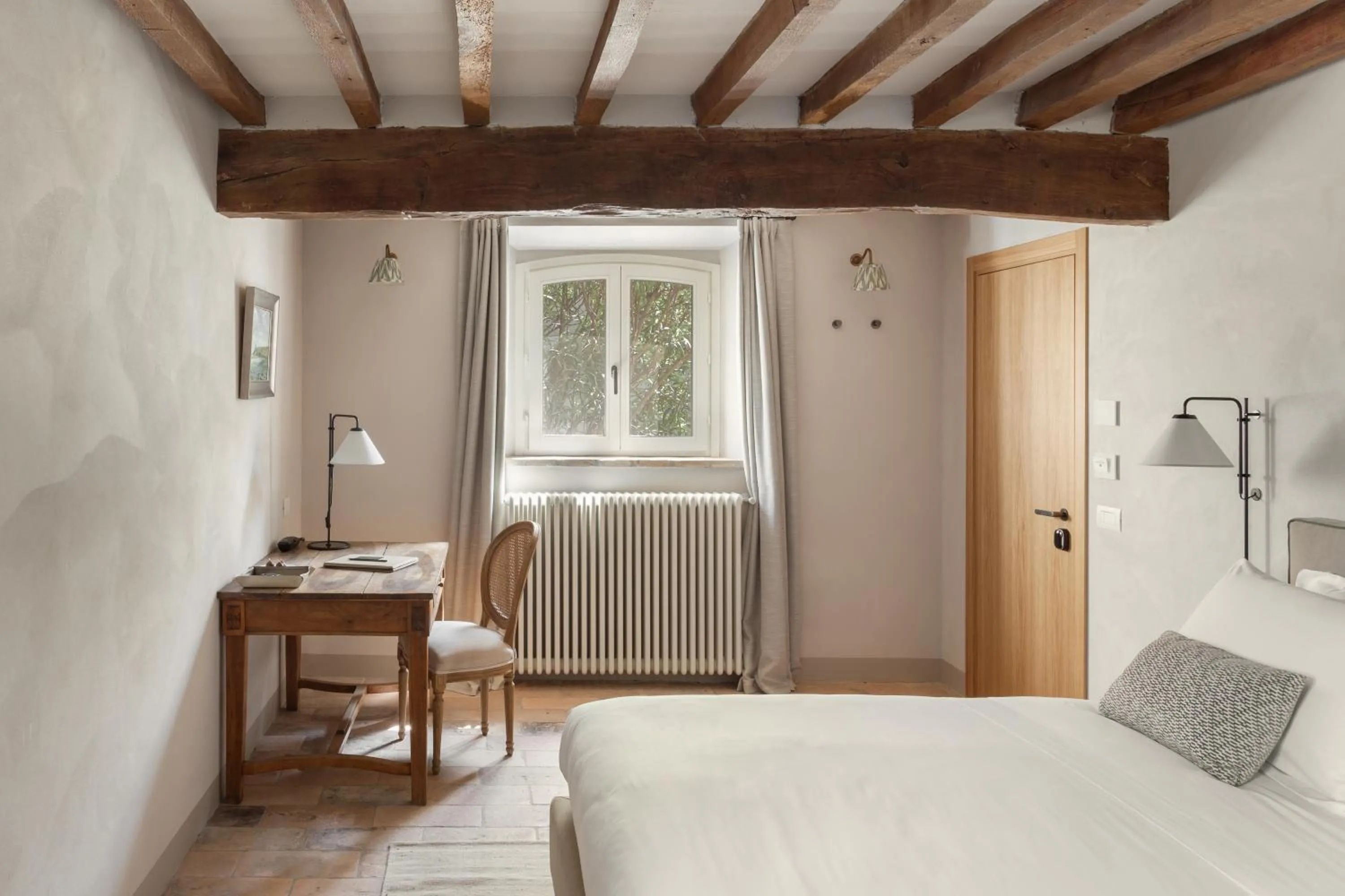 Bed in Relais Roncolo 1888 - Small Luxury Hotels of the World