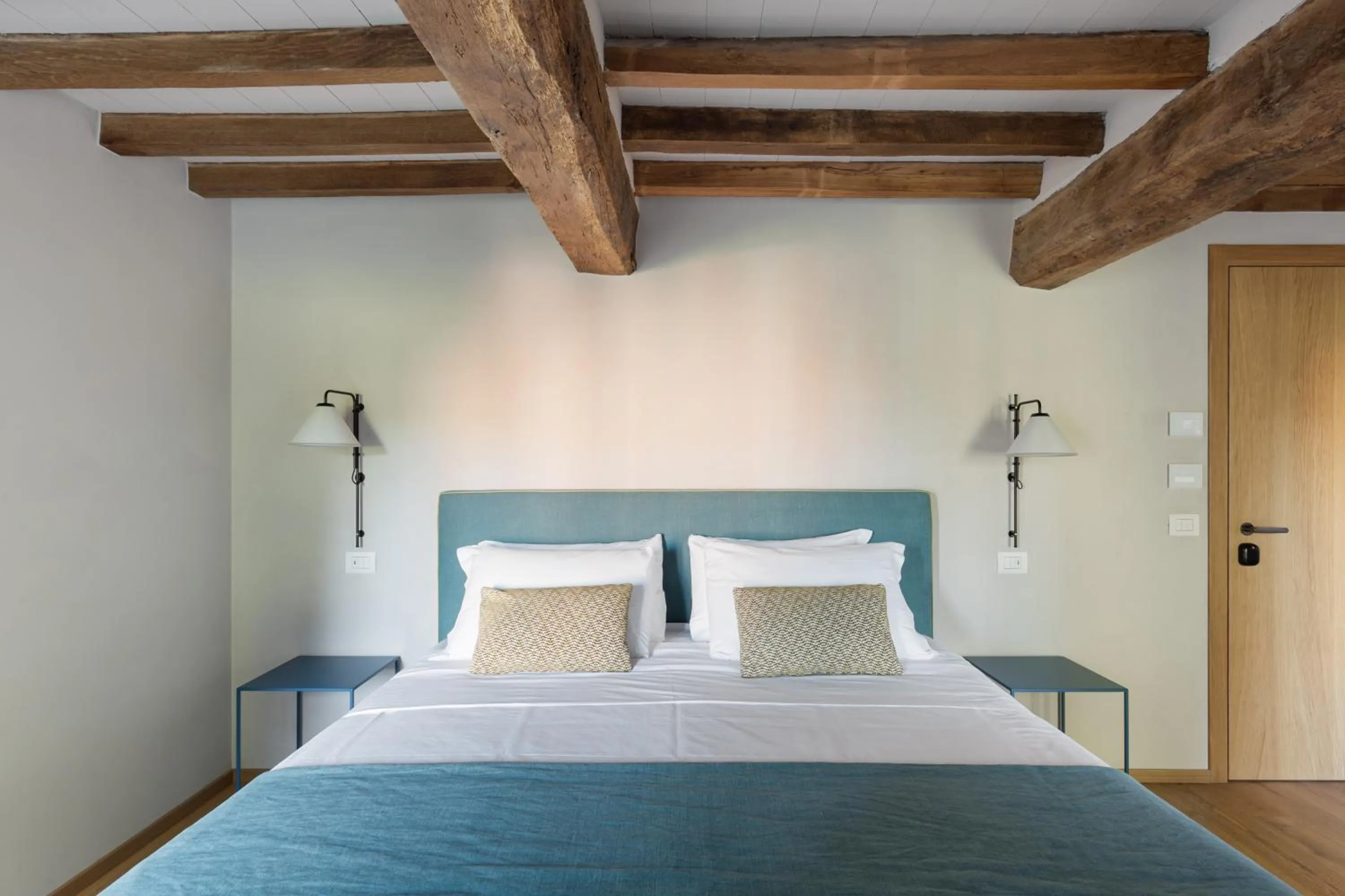 Bed in Relais Roncolo 1888 - Small Luxury Hotels of the World