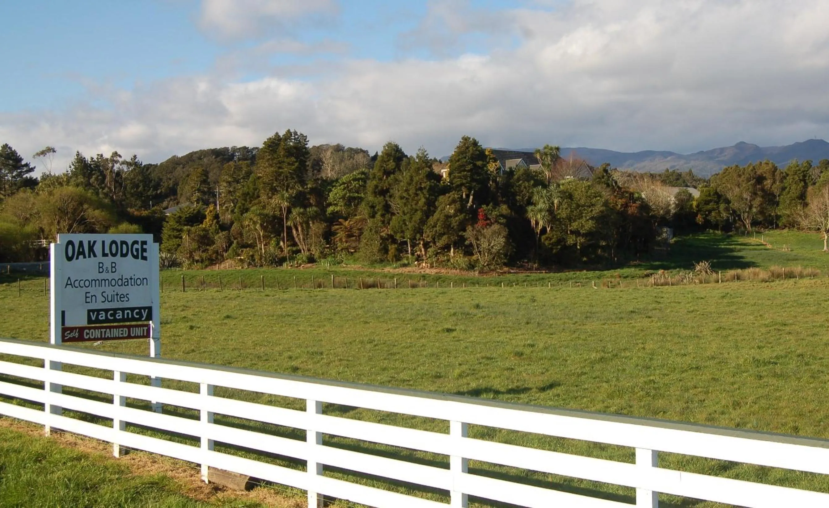 Property logo or sign in Oak Lodge