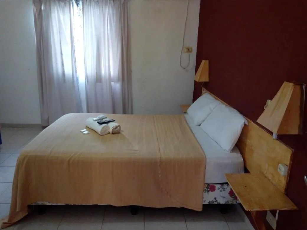 Bed in Petit Hotel Panambi