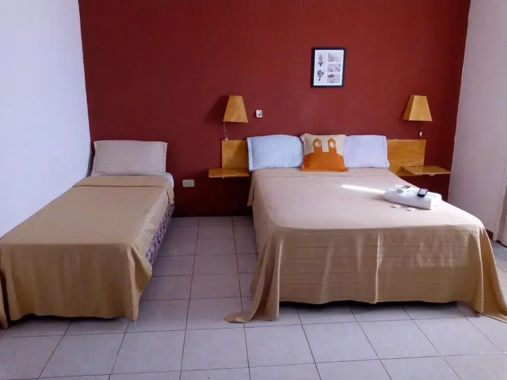 Triple Room in Petit Hotel Panambi Triple Room in Petit Hotel Panambi