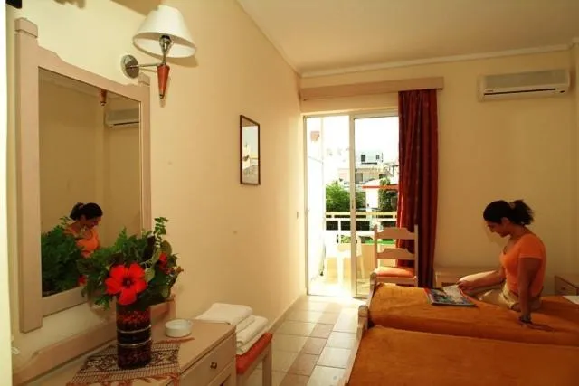 Bedroom in Theonia Hotel