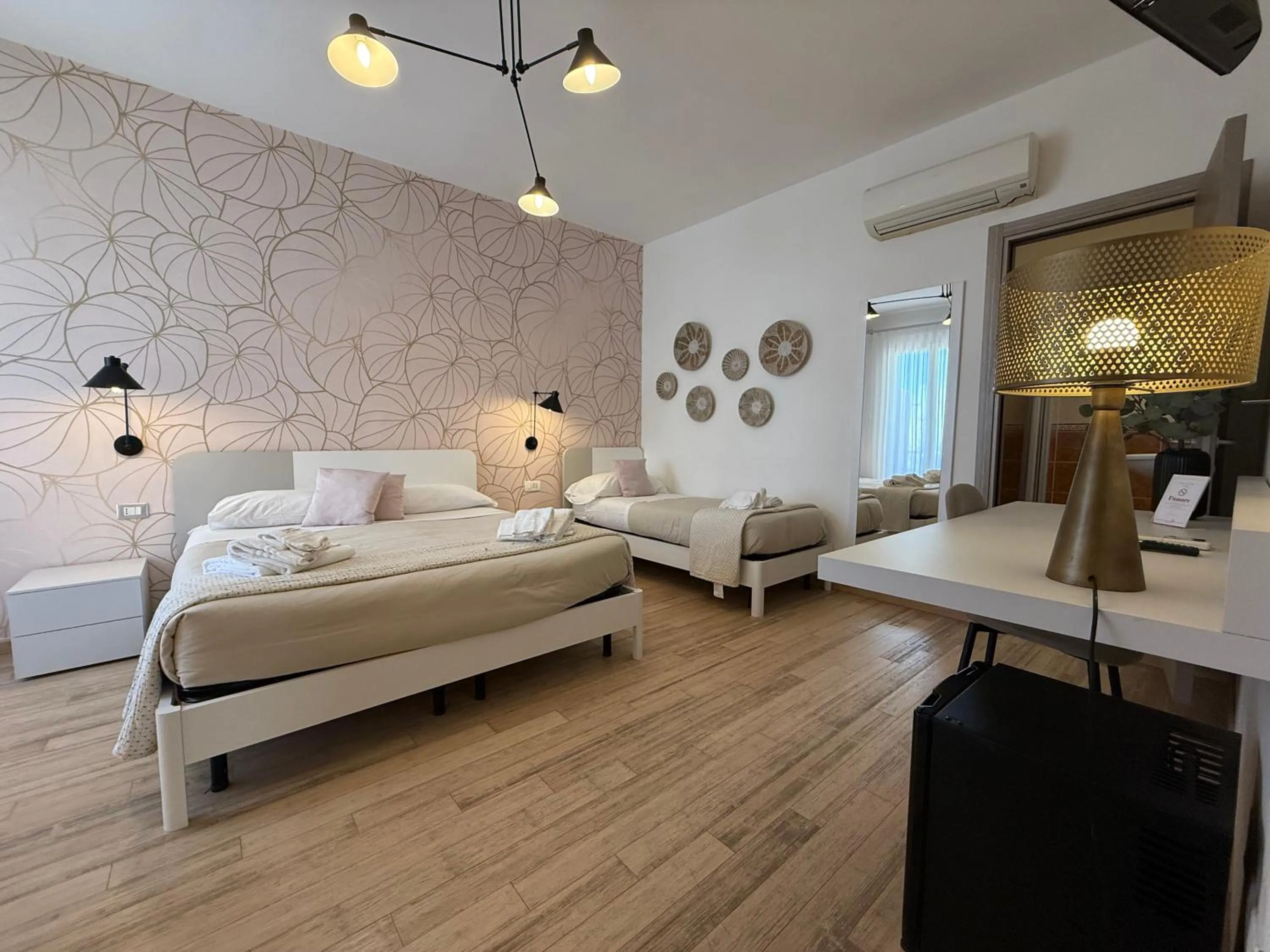 Bed in Albergo Perseo