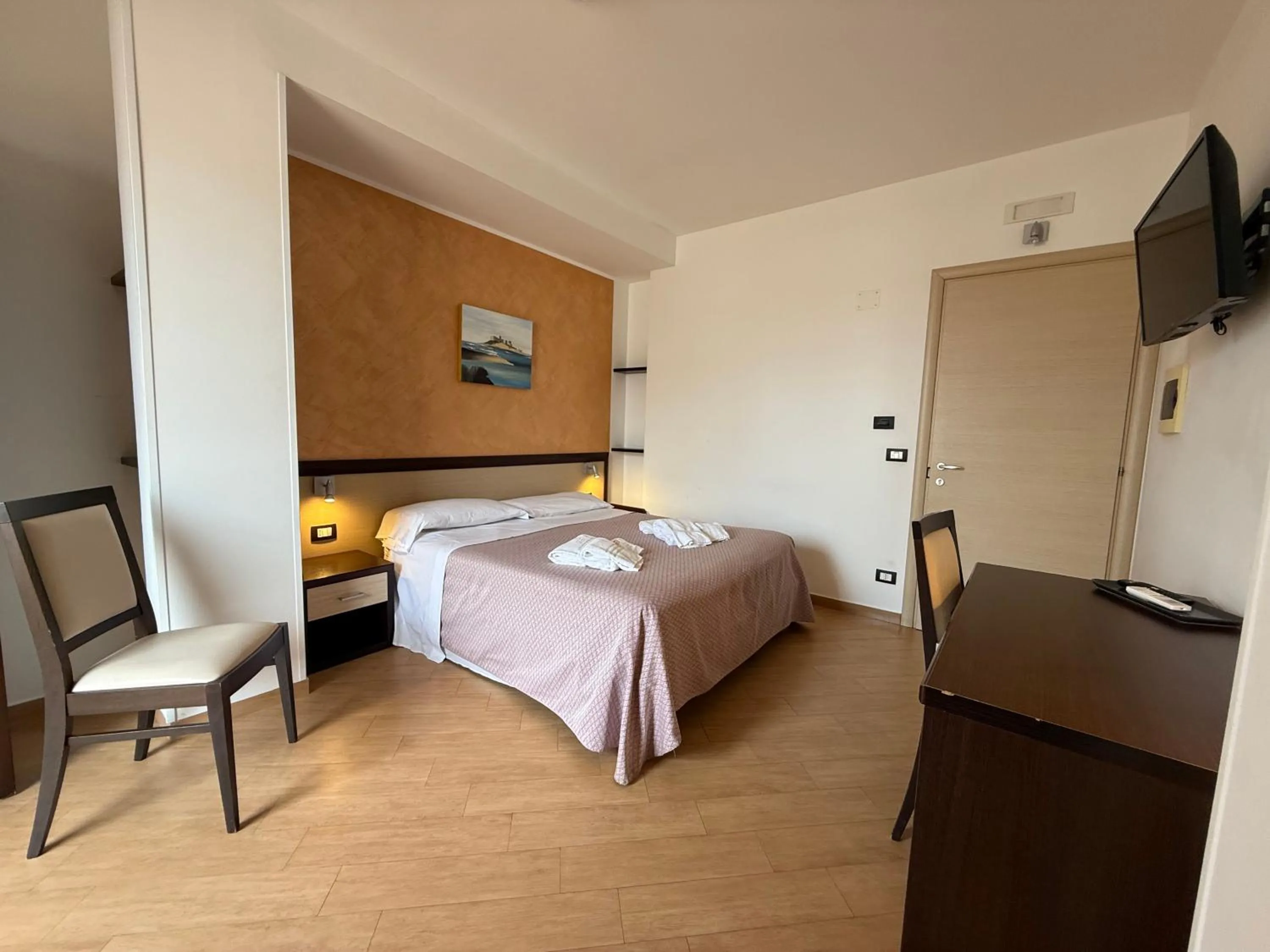 Bed in Albergo Perseo