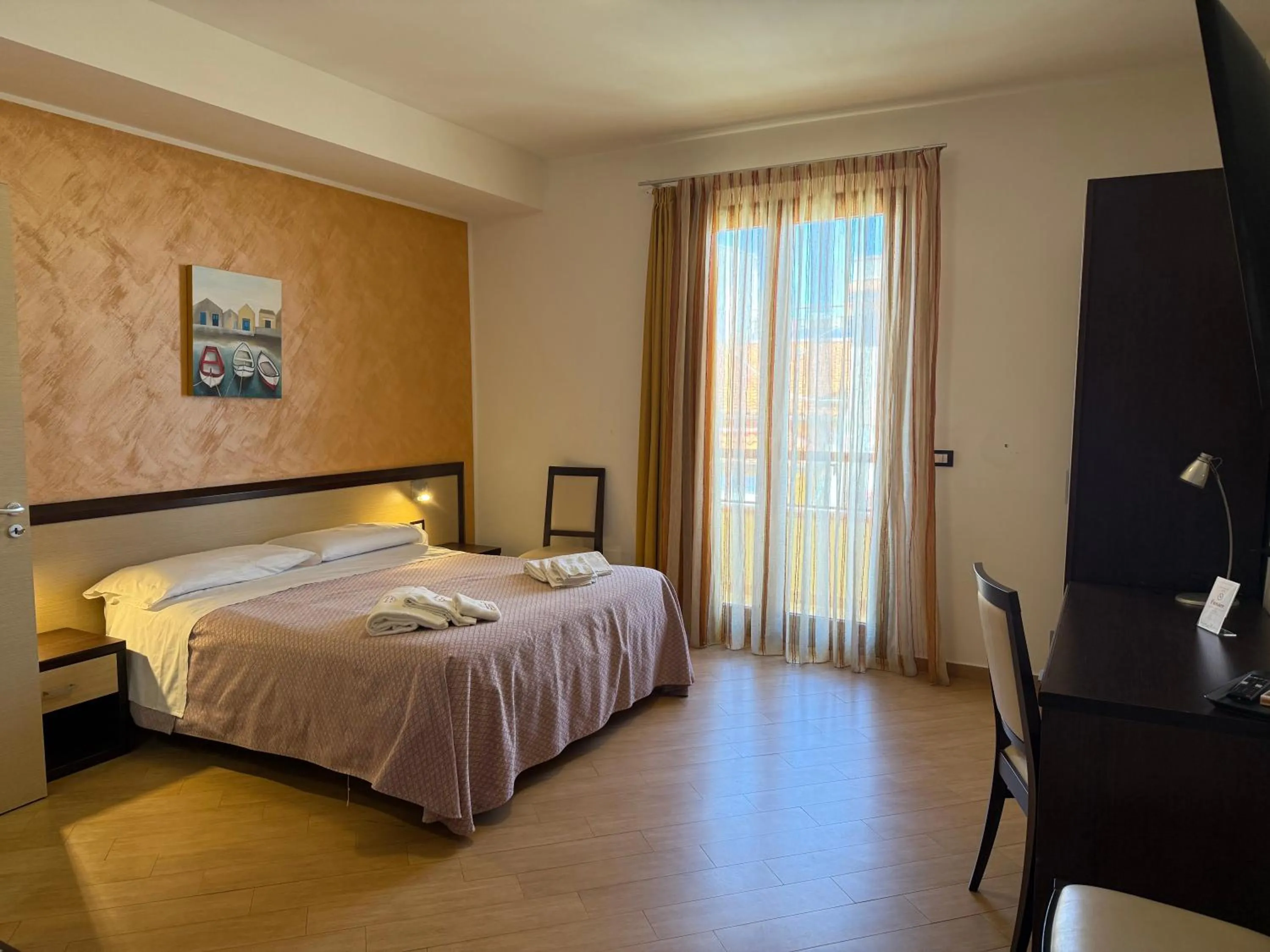 Bed in Albergo Perseo